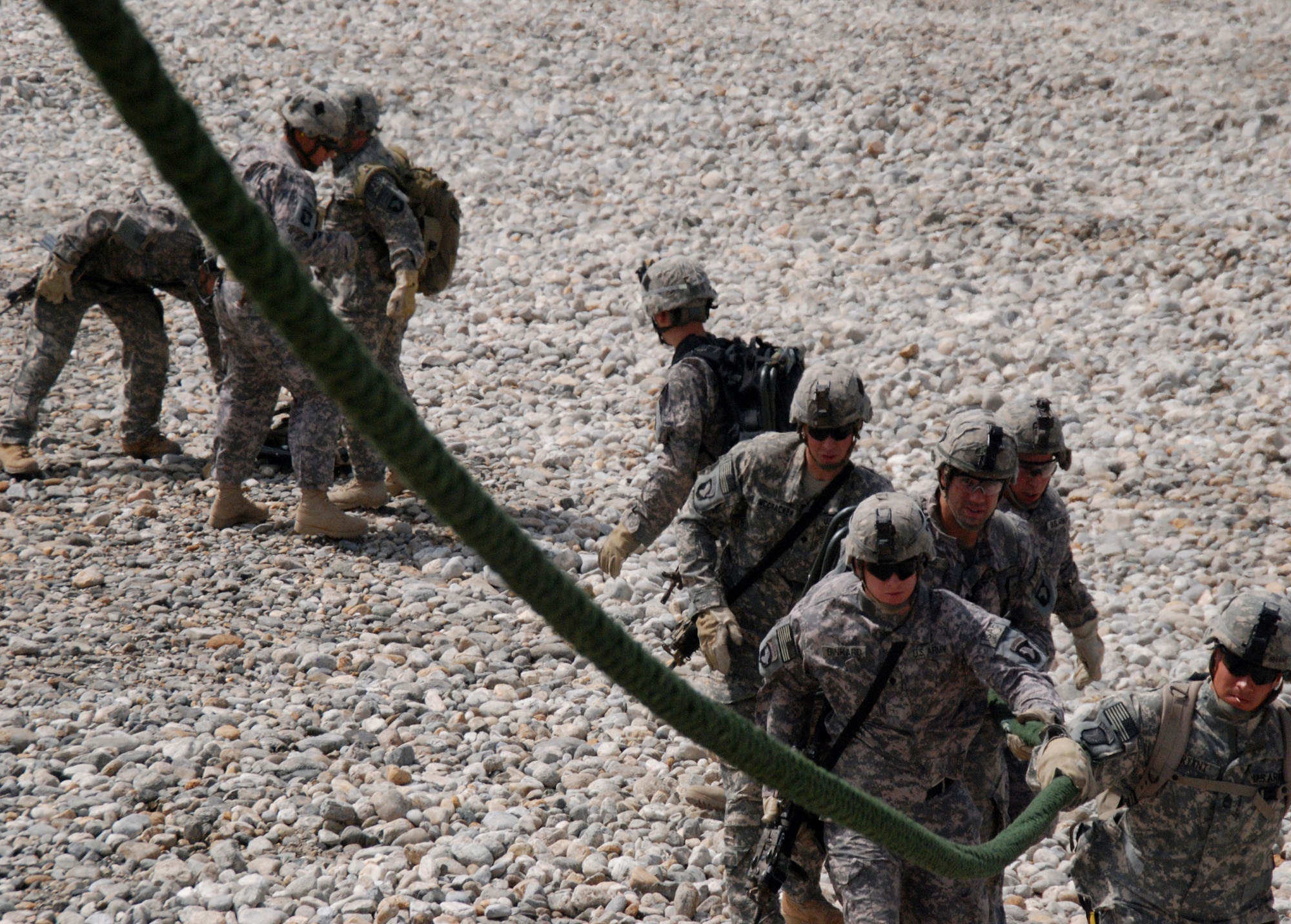 Soldiers of Pathfinder Detachment [Task Force Out Front] secure a rope after fast roping from a CH-47 during a Fast Rope Insertion Extraction System training exercise at Jalalabad, Afghanistan recently. (U.S. Army photo by Spc. George Welcome)