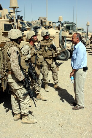 Steve King, a Representative from Iowa’s Fifth Congressional District, jokes with Marines during a static display of the weapons, tactical gear and vehicles used by the service members of Task Force 2d Battalion, 7th Marine Regiment, 1st Marine Division. (U.S. Marine Corps photo by Cpl. James M. Mercure)