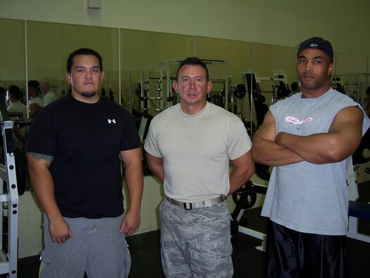 Pictured are the winners of the recent Bench Press Competition. 1st Place, Master Sgt. Joe Smith, U.S. Customs (right), who lifted 385 pounds; 2nd Place, Master Sgt. Ruben Negrete, 163 LRS (center), who lifted 275 pounds; and 3rd Place, Matt Carroll, family member (left), who lifted 365 pounds. Highest percent of body weight lifted won the competition. (U.S. Air Force photo)