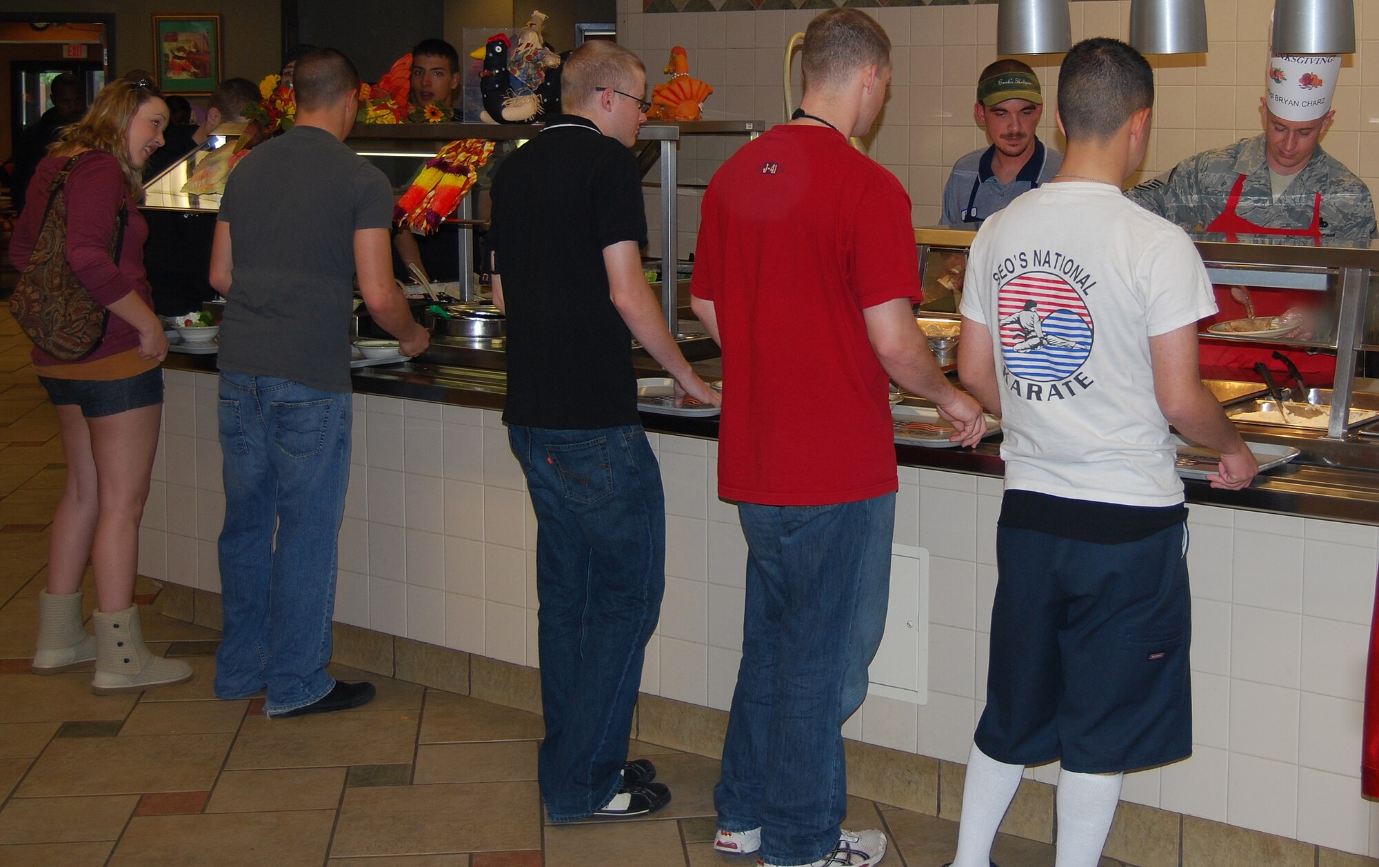 Master Sgt. Bryan Charz, 365th Training Squadron first sergeant, served Thanksgiving meal to Sheppard Airmen Nov. 27. Many Sheppard officers and senior enlisted members manned all of the food stations at the Sagebrush Dining Facility in this year's event. (U.S. Air Force photo/Staff Sgt. Vernon Cunningham)
