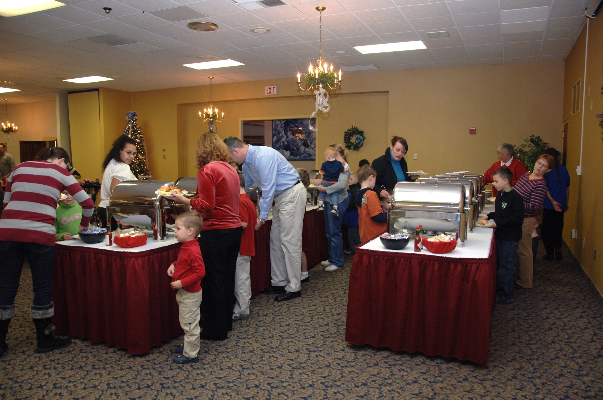 Ellsworth members and their families gather for a breakfast banquet at the Dakota's Club before the arrival of Santa Clause.  Entertainment including a magic show, cookie decorating and photos with Santa were provided during the event sponsored by the 28th Force Support Squadron. (U.S. Air Force photo/Senior Airman Anthony Sanchelli)