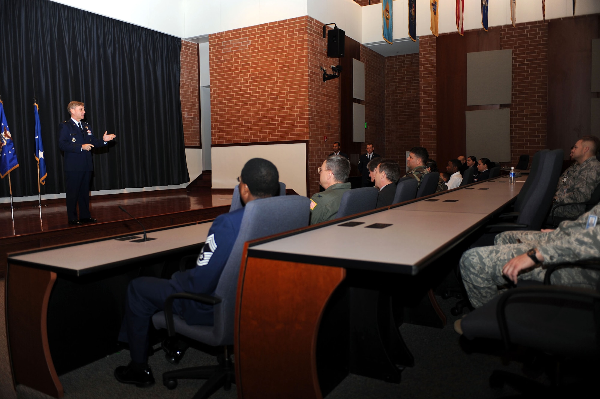 Maj. Gen. Kip Self, U.S. Air Force Expeditionary Center commander, addresses the EC "Eagles" on Wingman Day activities prior to the start of a promotion ceremony Nov. 26, 2008, in the Center's Grace Peterson Hall.  All members of the Expeditionary Center gathered that day to celebrate and learn from their fellow wingmen.  (U.S. Air Force Photo/Staff Sgt. Nathan Bevier)