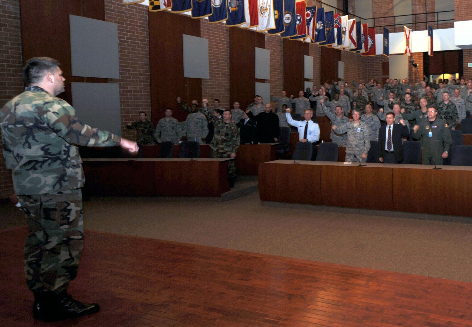 Col. Greg Otey, U.S. Air Force Expeditionary Center vice commander, leads the EC "Eagles" in a battle cry of "We are...Eagles" during Wingman Day activities on Fort Dix, N.J., Nov. 26, 2008.  All members of the Expeditionary Center gathered that day to celebrate and learn from their fellow wingmen.  (U.S. Air Force Photo/Staff Sgt. Nathan Bevier)