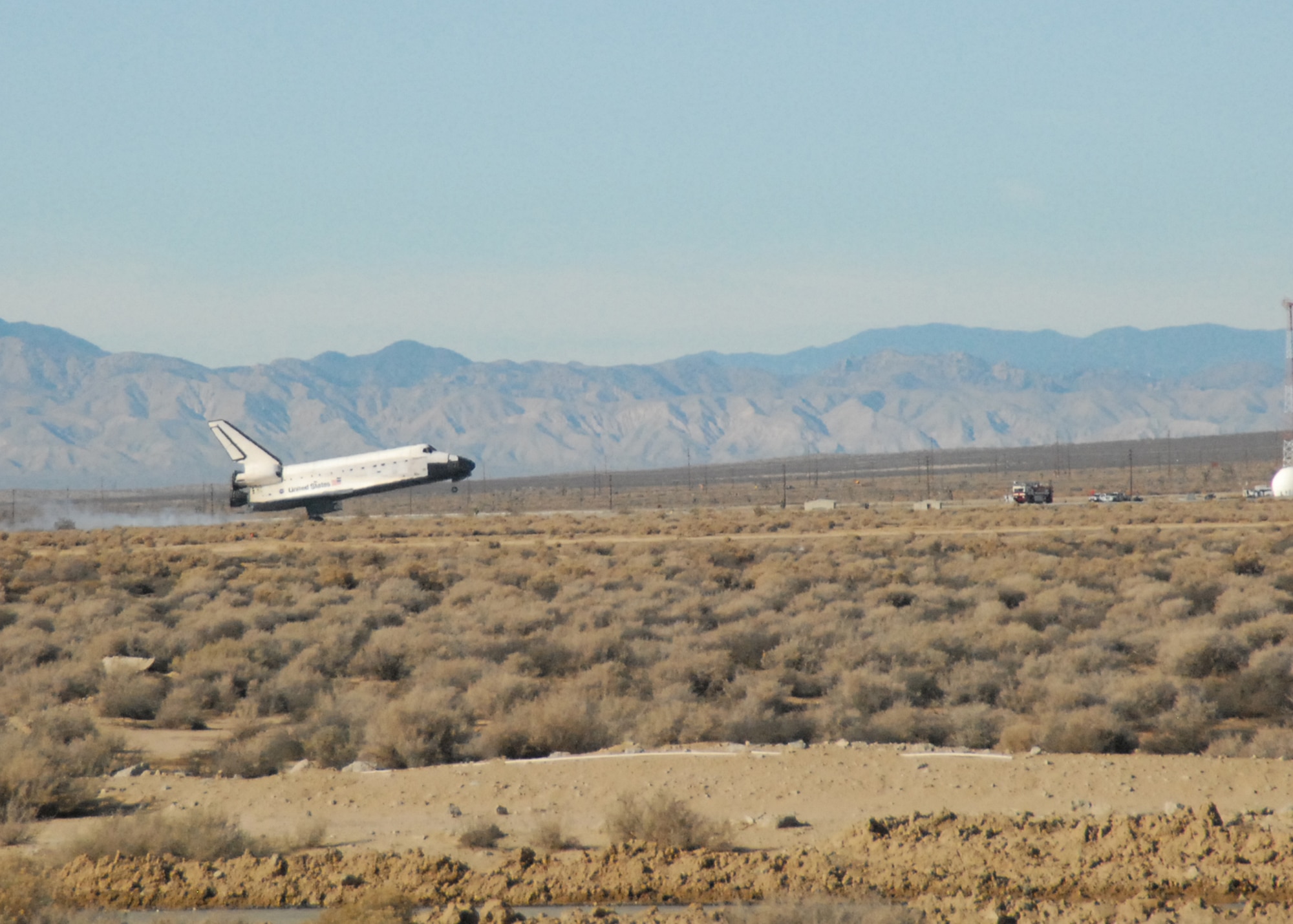 The space shuttle Endeavor touches down on Edwards' runway 04-left at approximately 1:25 p.m. Nov. 30. This is the 52nd time NASA has been required to use Edwards as its alternate landing site. In preperation for this, the base is required to conduct two exercises a year by Human Space Flight to ensure the base's capabilities to support a shuttle landing meets NASA's standards. (Air Force photo by Airman 1st Class William O'Brien)