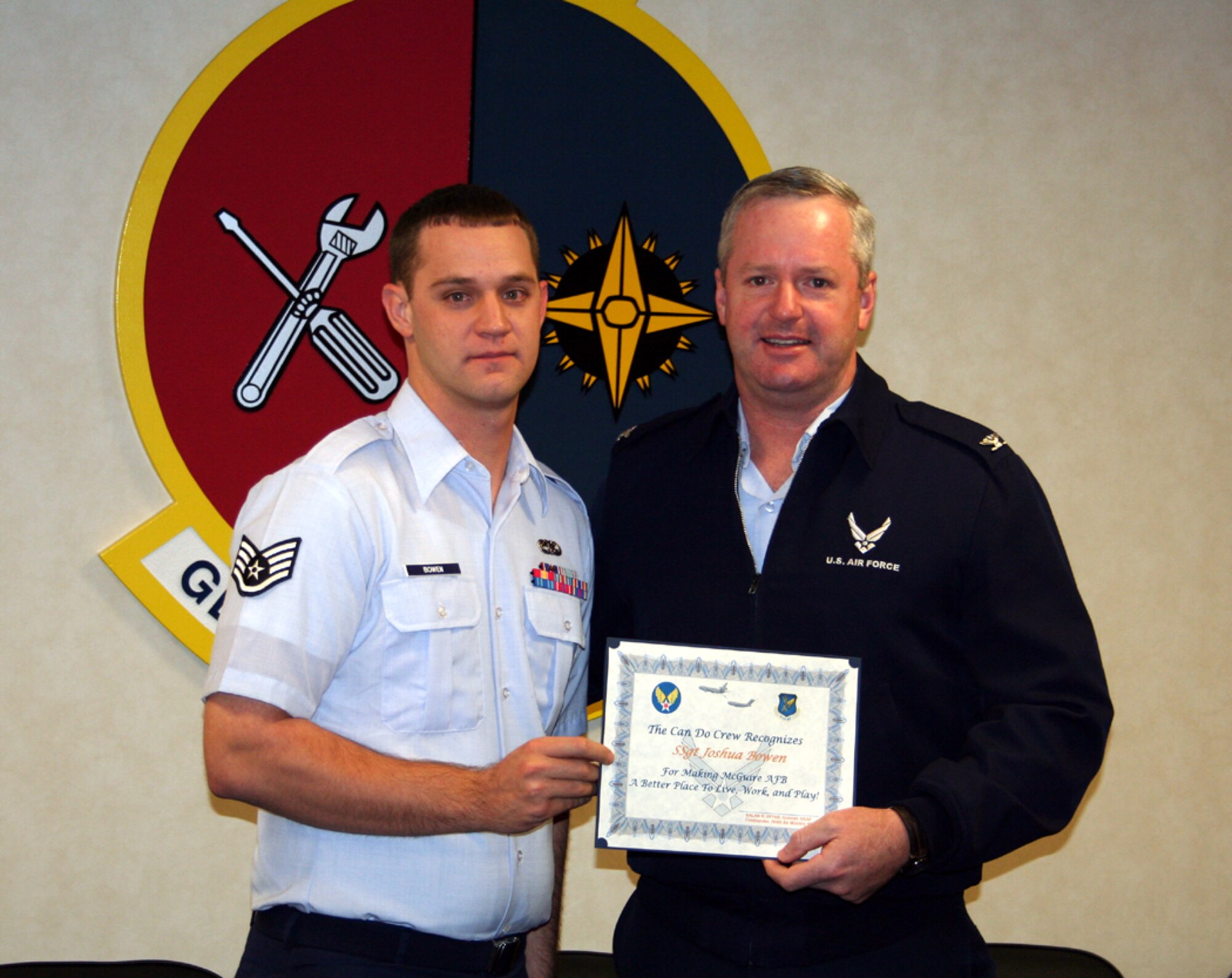 Right, Col. Scott Smith, 305th Air Mobility Wing vice commander, presents a McGuire Can Do Crew award to Staff Sgt. Joshua Bowen, 305th Maintenance Operations Squadron. His nomination is below: 

“Sergeant Bowen epitomizes the characteristics of integrity on a daily basis. A great example of these characteristics was his assignment to load GO81 (a core automated maintenance data system used to record all maintenance actions on Air Mobility Command aircraft) for Pacific Air Force members at Kadena AB, Japan, and Hickam AFB, Hawaii. He was hand-selected to fly out, load the new system, transfer data and train PACAF members on accurate GO81 operation. Not only did he take on this challenge like a champion, but he completed all tasks in a timely manner (almost half the time it would normally take). Sergeant Bowen was a perfect selection for this assignment and exemplifies integrity, followership and leadership on a daily basis. According to Tech. Sgt. Sean Flowers, ‘We all have our bad days, but even Sergeant Bowen’s bad days serve as a positive example of how we should behave as members of the greatest fighting force in the world. I’m both honored and lucky to work with him!’”