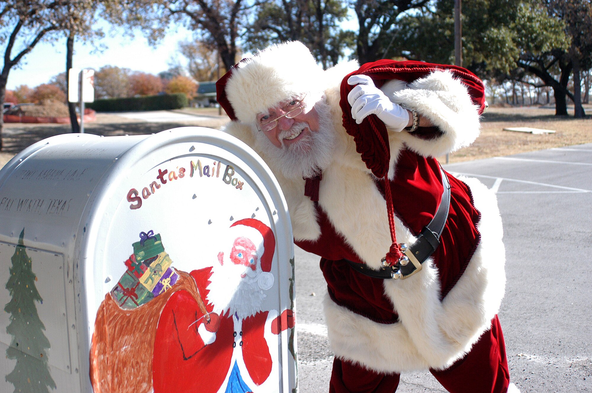 Santa makes a quick stop at the Naval Air Station Joint Reserve Base Fort Worth, Texas, to pick up some last minute letters. Santa (Dr. Don Shelton), a Fort Worth Airpower Council member, will also make a stop by the 301st Fighter Wing to visit families December 7th at the 301st Fighter Wing maintenance hangar, Bldg. 1643 at 3:30 p.m. (U.S. Air Force Photo/Tech. Sgt. Stephen Bailey)