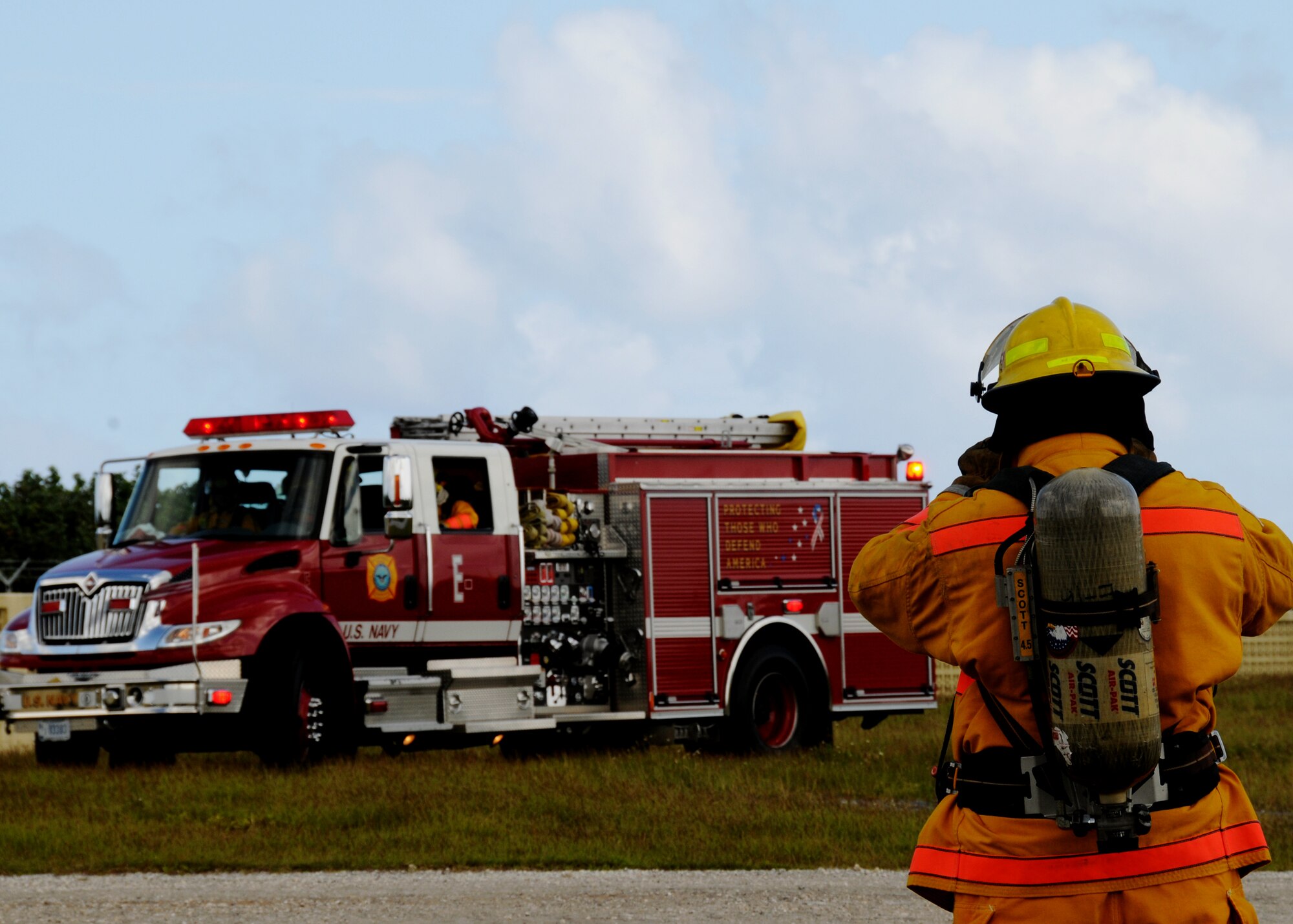 ANDERSEN AIR FORCE BASE, Guam - U.S. Navy Firemen simulate the arrival on scene during structural training here Nov. 20. Andersen is home to the only fire simulator training facilities in both aircraft and structural fires on Guam. (U.S. Air Force photo by Senior Airman Nichelle Griffiths)