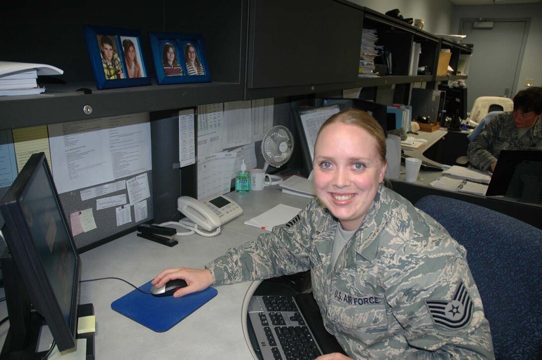 Tech. Sgt. Amy Baker takes a break from money matters in the 446th Airlift Wing's Financial Management Office.  Sergeant Baker is a financial management and comptroller specialist in the Air Force Reserve.  In her civilian occupation, she works as a recreational therapist with Providence Health System in Washington.  After 12 years of service, Sergeant Baker likes the camaraderie of serving in the Reserve. She is one of more than 2,400 Citizen Airmen in the 446th AW serving our nation. (U.S. Air Force photo/2nd Lt. Candice Allen
