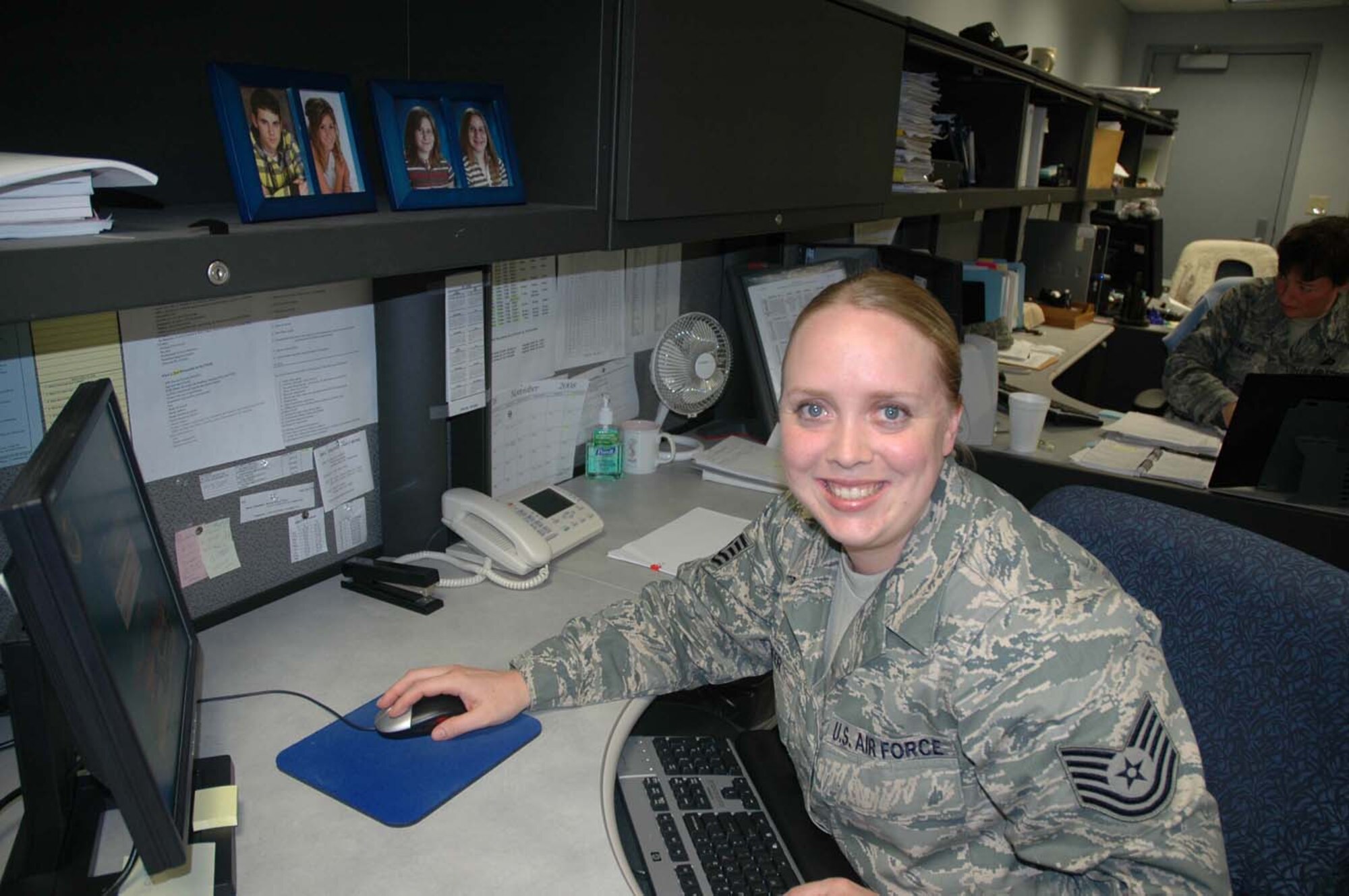Tech. Sgt. Amy Baker takes a break from money matters in the 446th Airlift Wing's Financial Management Office.  Sergeant Baker is a financial management and comptroller specialist in the Air Force Reserve.  In her civilian occupation, she works as a recreational therapist with Providence Health System in Washington.  After 12 years of service, Sergeant Baker likes the camaraderie of serving in the Reserve. She is one of more than 2,400 Citizen Airmen in the 446th AW serving our nation. (U.S. Air Force photo/2nd Lt. Candice Allen