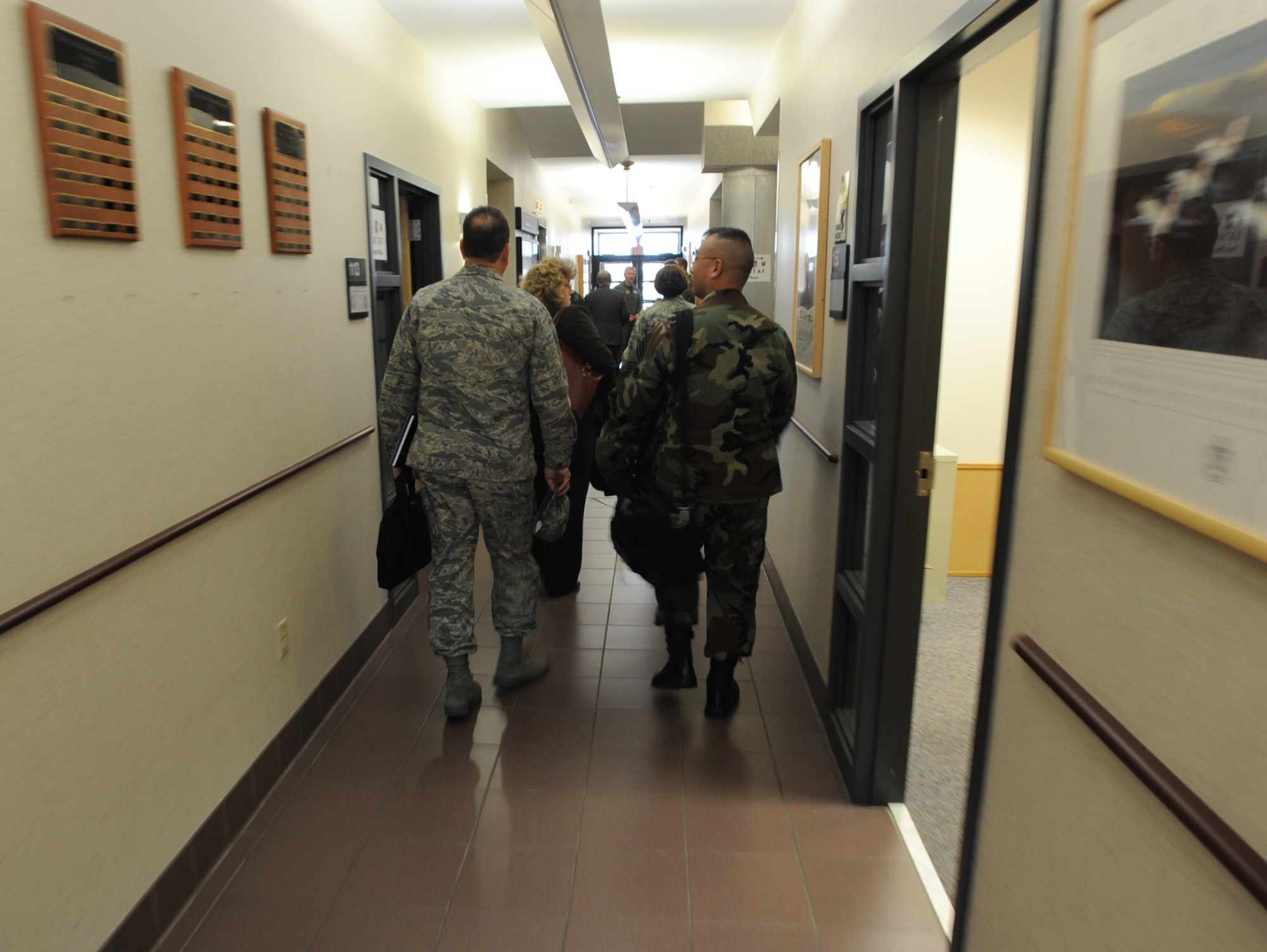 Members of a Site Activation Task Force get a quick tour of the 931st Air Refueling Group headquarters building before breaking up into working groups to discuss significant growth within the 931st. More commonly known as a SATAF, the task force received a total-force welcome to McConnell Air Force Base, Kan., on Dec. 2. The 931st Air Refueling Group is an Air Force Reserve unit and the 22nd Air Refueling Wing is the 931st's host unit at McConnell. (U.S. Air Force photo/Tech. Sgt. Jason Schaap)