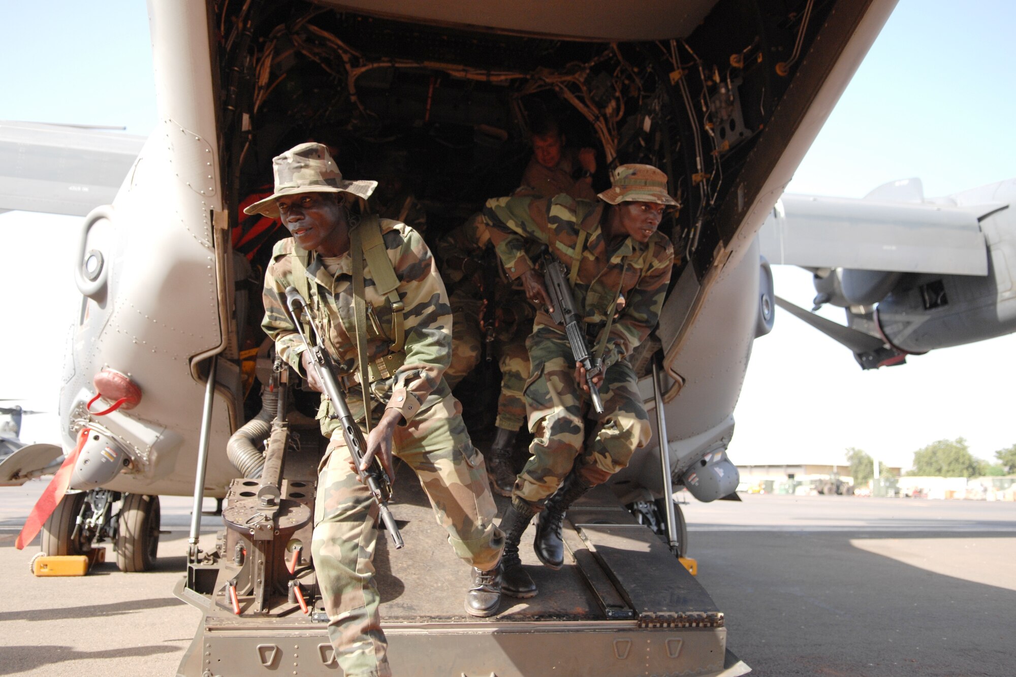 Senegalese soldiers exit an Air Force Special Operations Command CV-22 Osprey during mission rehearsals as part of exercise Flintlock in Bamako, Mali on November 16, 2008. Flintlock is a multilateral military training exercise which seeks to further the training and proficiencies of participating nations across the Trans-Saharan region of Africa, while fostering collaborative communication and coordination skills. (U.S. Air Force photo)