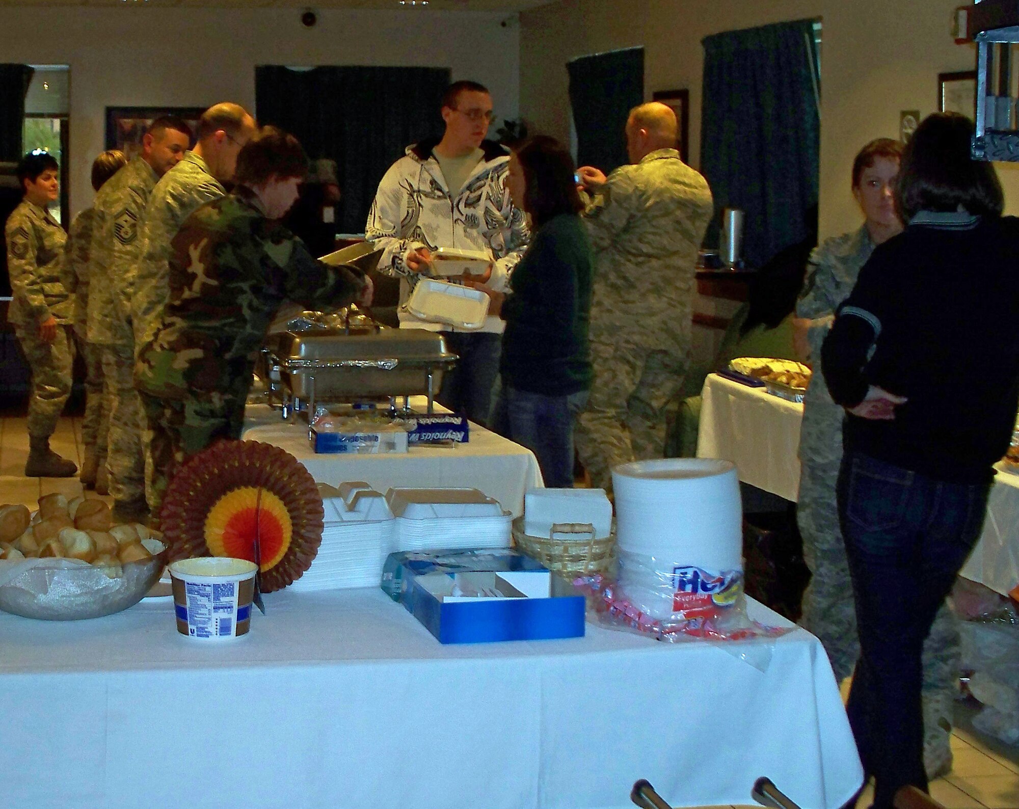 Airmen from Peterson and Schriever Air Force Base enjoy a Thanksgiving feast at Peterson AFB, Nov. 20. The annual dinner was free and hosted by the Peterson and Schriever First Sergeants. (Photos by Airman 1st Class Thomas Davis)
