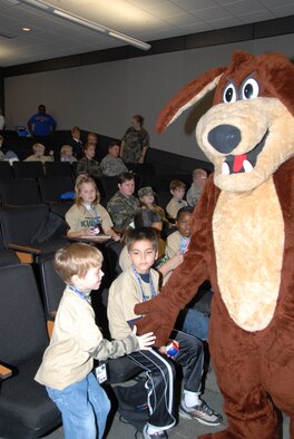 Wiley Coyote hangs out with the kids prior to their mock deployment during November’s Kids Understanding Deployment Operations (KUDOS). 
(photo by Master Sgt. Allen Pickert)