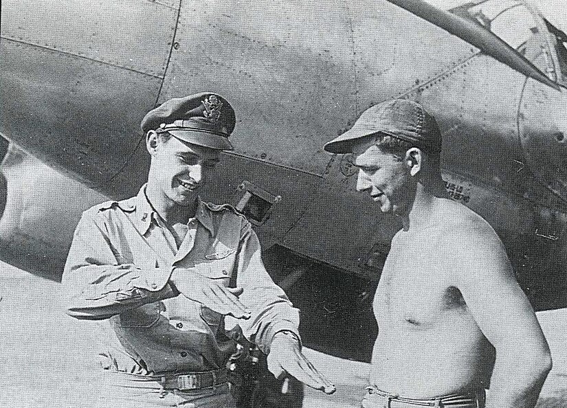 LANGLEY AIR FORCE BASE, Va. -- Tom Maloney, left, is explaing to his crew chief about his fifth aerial victory near Ploesti on May 31, 1944.  (Courtesy photo) 

