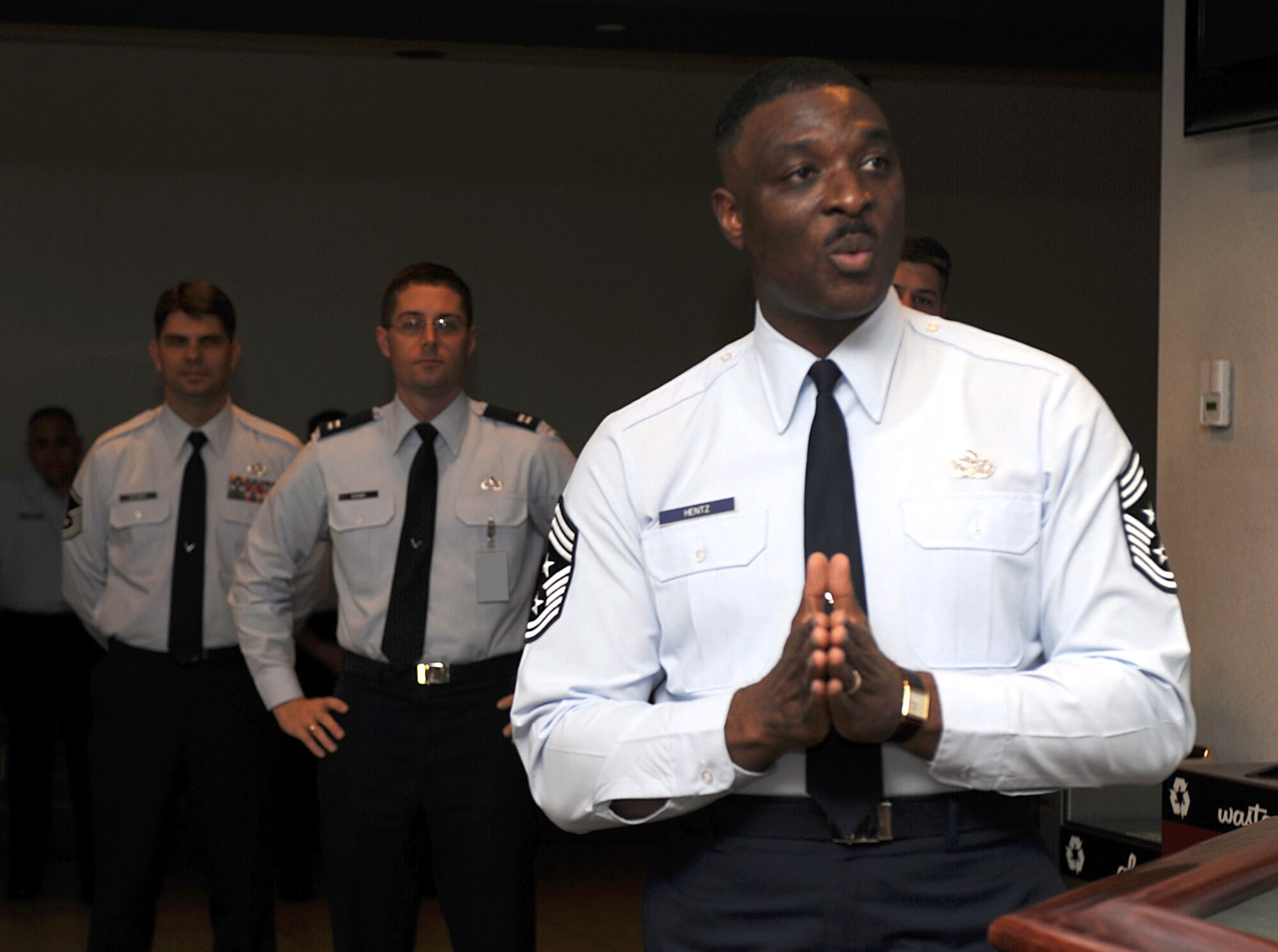 Chief Master Sgt. Fitzgerald Hentz, new command chief for the U.S. Air Force Expeditionary Center, talks to the EC "Eagles" in attendance for a "hail to the command chief" Dec. 1, 2008, in the Center.  Chief Hentz arrives after completing a deployment to Iraq.  (U.S. Air Force Photo/Staff Sgt. Nathan Bevier)