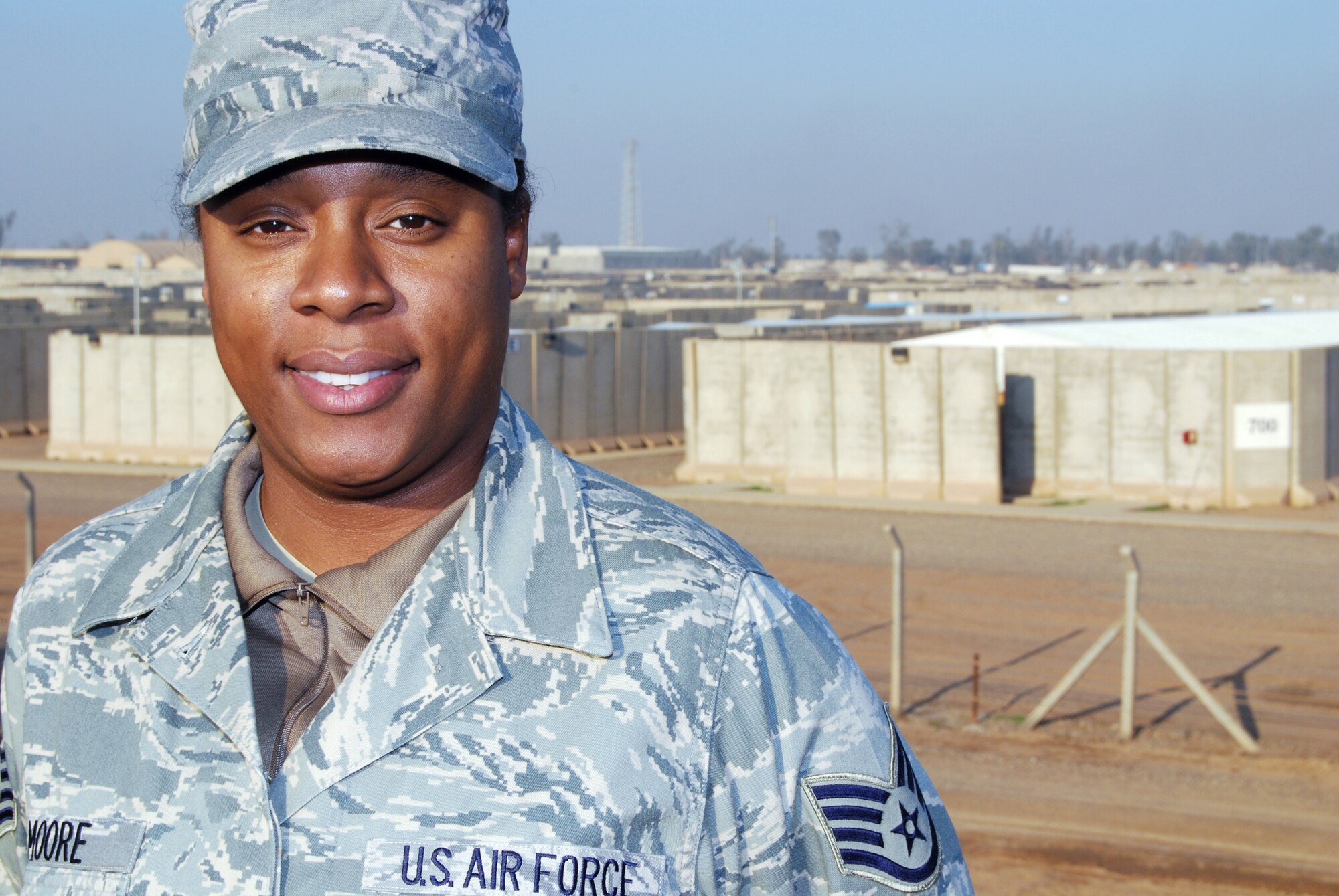 Staff Sgt. Sadia Moore is the 332nd Air Expeditionary Wing's Tuskegee Airman of the Week for Nov. 20-26. Moore, a lodging specialist with the 332nd Expeditionary Force Support Squadron at Joint Base Balad, Iraq, streamlined lodging check-in and check-out procedures by migrating the office to an electronic system, reducing patrons' inprocessing and outprocessing times by an hour. (U.S. Air Force photo/Staff Sgt. Don Branum)