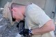 SOUTHWEST ASIA -- Staff Sgt. Wayne Byrd from the 380th Expeditionary Civil Engineer Squadron prepares a cable termination here Nov. 25. The cable is going to feeder circuits to provide a new ECES building with electricity. Sergeant Byrd is deployed from the 735th CES Ramstein Air Base, Germany, his hometown is Casa Grande, Ariz. (U.S. Air Force photo/Tech. Sgt. Christopher A. Campbell)(released)