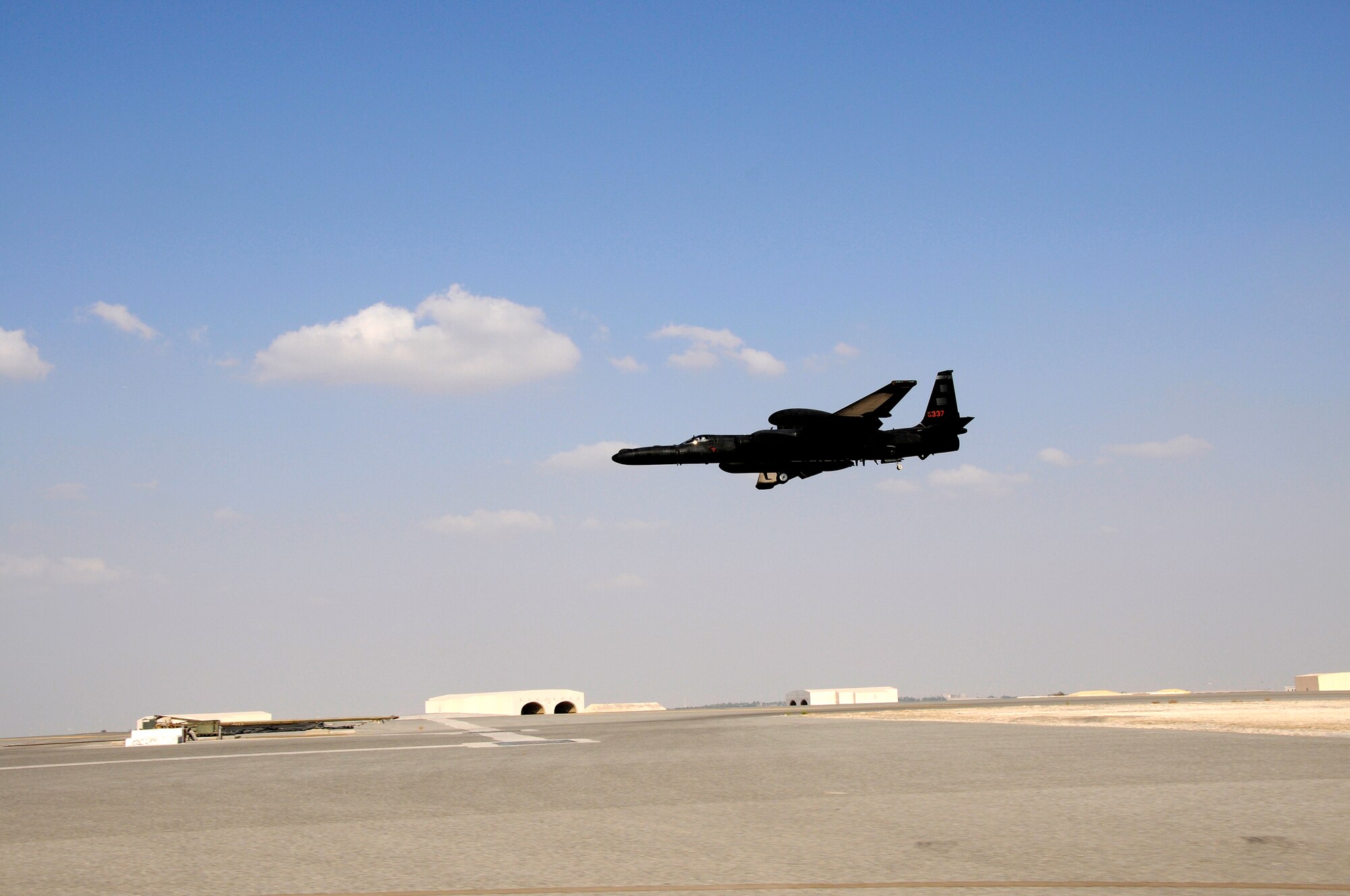 SOUTHWEST ASIA --  Maj. John Merten, a member of the 99th Expeditionary Reconnaissance Squadron, prepares to land his U-2 Dragonlady here Dec. 2. Maj. Merten passed 1,000 hours of flying in a U-2 during this mission. He is deployed from the 1st RS out of Beale Air Force Base, Calif., his hometown is Boulder, Colo. (U.S. Air Force photo/Tech. Sgt. Christopher A Campbell)(released)