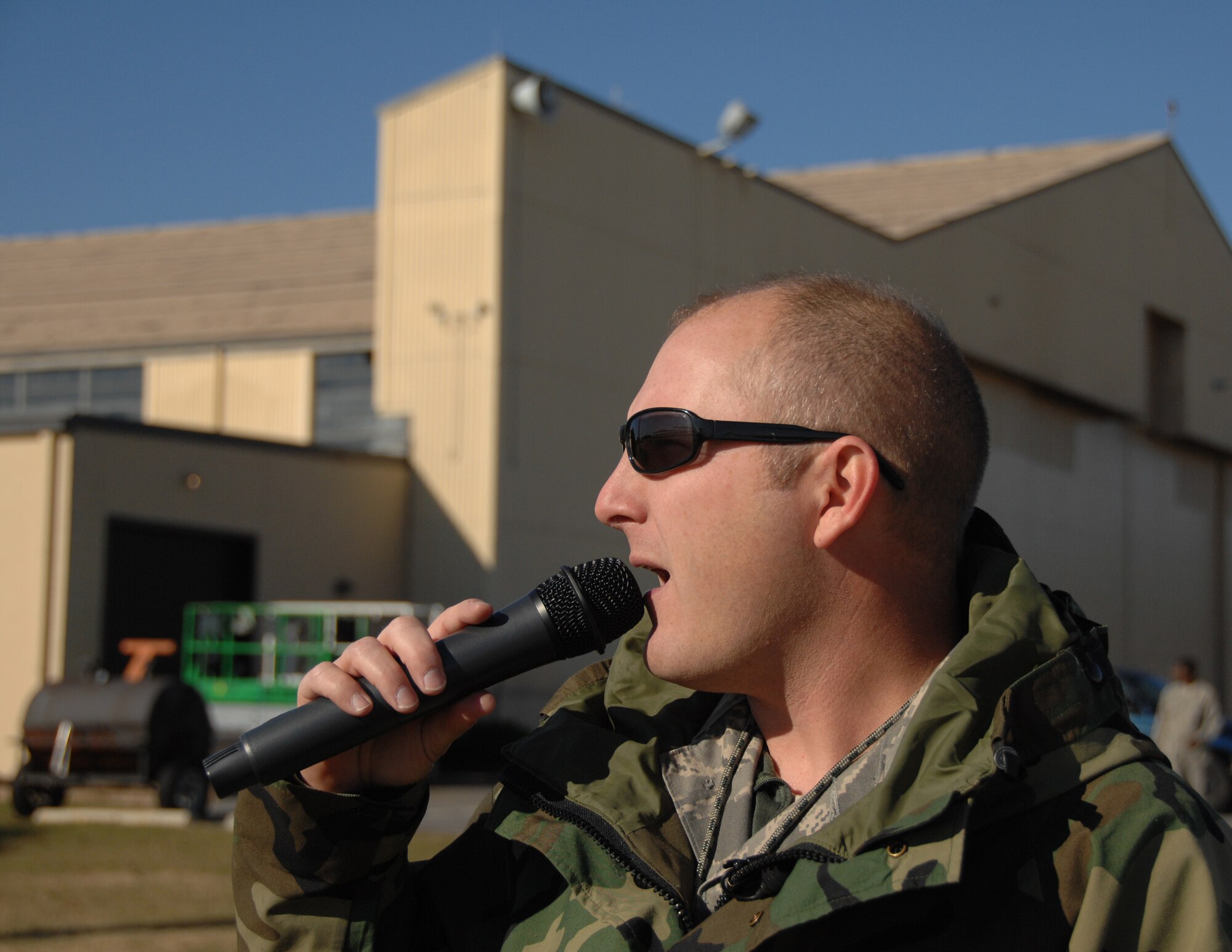SHAW AIR FORCE BASE, S.C. -- Master Sgt. Bryan Spangler is the team chief and the voice of Viper East. When Major clifford is in the air, Sergeant Spangler is on the ground with microphone in hand, vividly describing the stunts, capabilities, and maneuvers of the F-16 to spectators. (U.S. Air Force photo/2nd Lt. Emily Chilson)