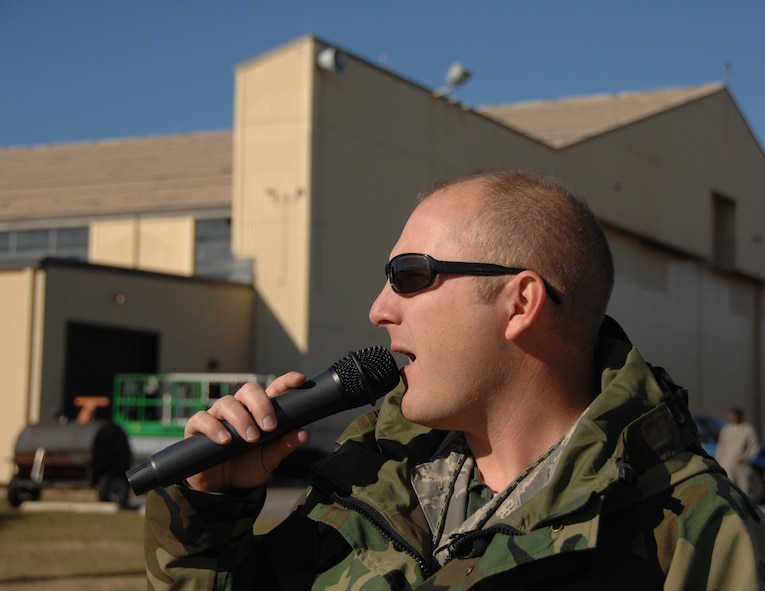 SHAW AIR FORCE BASE, S.C. -- Master Sgt. Bryan Spangler is the team chief and the voice of Viper East. When Major clifford is in the air, Sergeant Spangler is on the ground with microphone in hand, vividly describing the stunts, capabilities, and maneuvers of the F-16 to spectators. (U.S. Air Force photo/2nd Lt. Emily Chilson)
