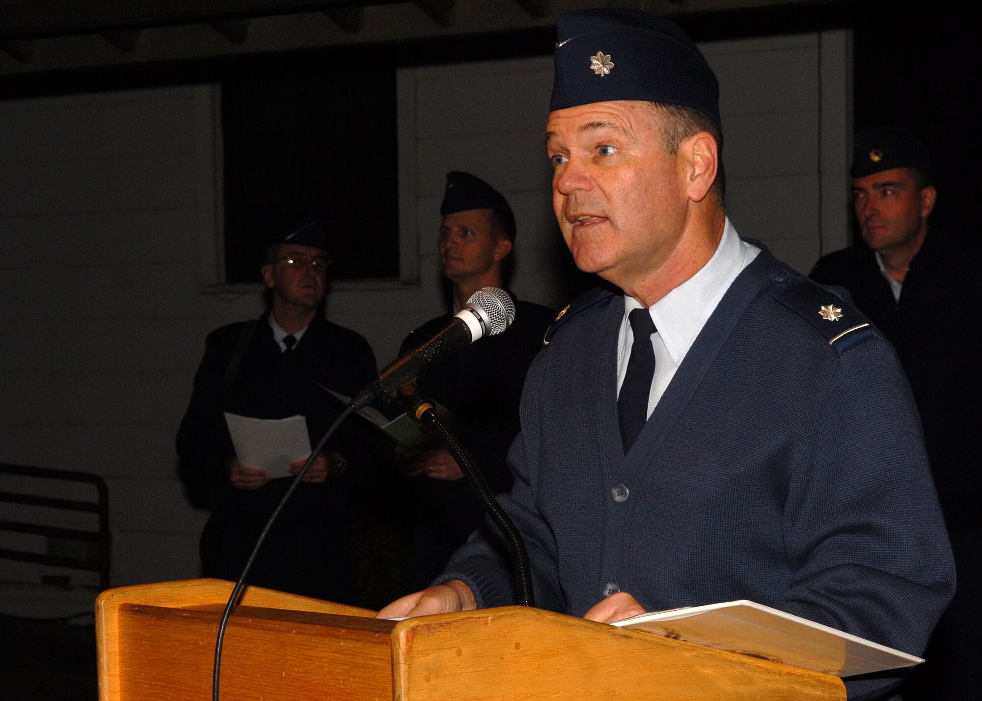 Lieutenant Col.James Ludwikowski, 17th Training Wing chaplain, addresses those gathered at the annual Goodfellow Air Force Base chapel and tree lighting ceremony on Dec. 1.  This marked the final year that lighting the old chapel would be part of the ceremony as it is due to be demolished in the coming months as chapel services move into a newly constructed building. (U.S. Air Force photo by Senior Airman Kasabyan Musal).