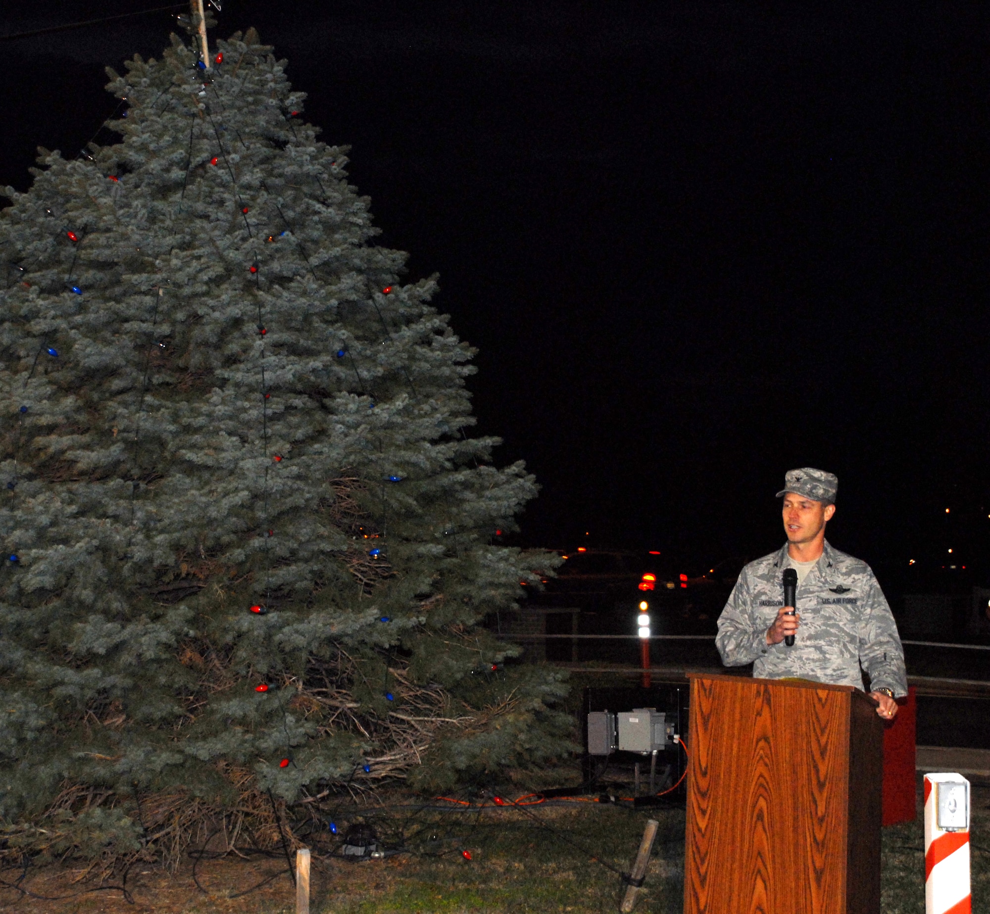 Col. Steven Harrison, 436th Airlift Wing commander, hosted the annual Christmas tree lighting ceremony Dec. 2.  The event included Christmas carols, lighting the tree and a visit from Santa Claus.  (U.S. Air Force photo/Staff Sgt. Chad Padgett)