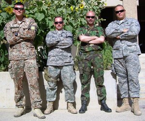 BAGHDAD, Iraq - Maj. James H. Camarena, right, is currently deployed from Langley. He said,  "We have it VERY good in the US. We have been richly blessed, and if we're not careful, we will lose what we have. We've become too wrapped around our own selfish interests that we have lost sight of showing compassion and caring for others. This place has helped me realize that some of the precious basic things we complain about are outright foreign concepts to these people. I hope I won't take for granted a simple thing such as pure drinking water." (Courtesy photo)   