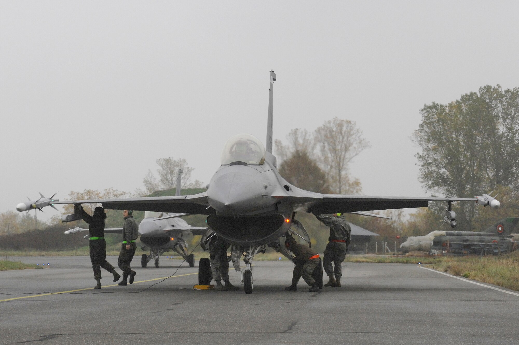 Crew Chiefs from the 31st Aircraft Maintenance Squadron double-check an F-16 from the 555th Fighter Squadron before it takes off to complete a sortie during the 2008 Nickel Javelin exercise on Nov. 7. Nickel Javelin is a 26-day bilateral training exercise between the U.S. and Bulgarian Air Forces which took place at Graf Ignatievo Air Base, Bulgaria. Approximately 250 Airmen from Aviano Air Base participated in the exercise.  (U.S. Air Force photo/Airman 1st Class Ashley Wood)