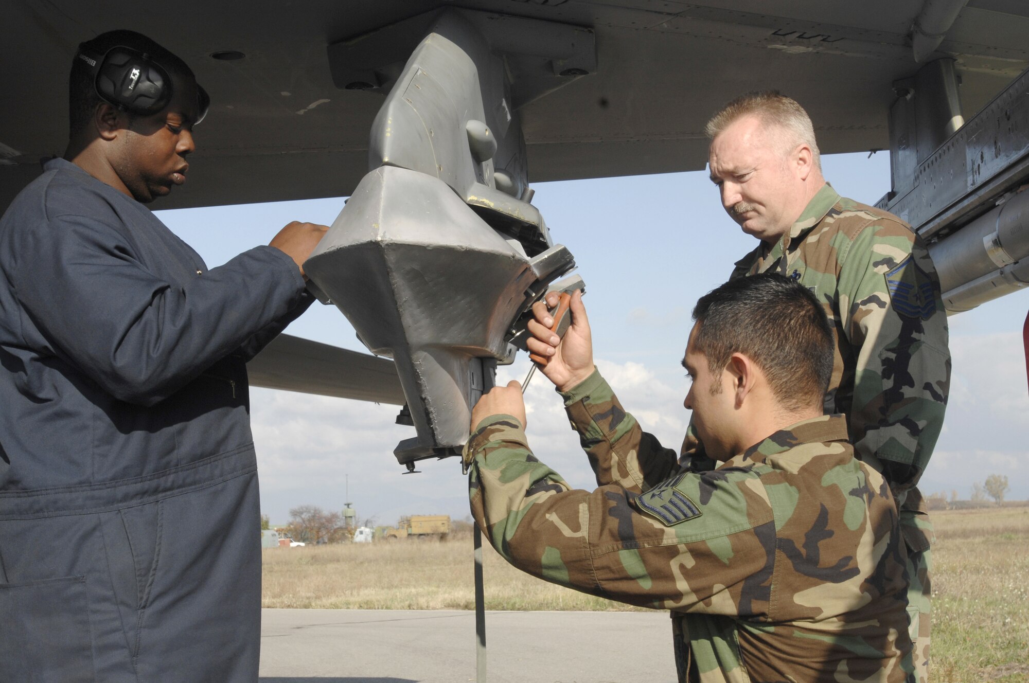 Airmen from the 31st Aircraft Maintenance Squadron prepare to load Bomb Dummy Unit 50's to an F-16 Fighting Falcon during exercise Nickel Javelin Nov. 10, 2008.  Nickel Javelin is a 26-day bilateral training exercise between the U.S. and Bulgarian Air Forces. Approximately 250 Airmen from Aviano Air Base participated in the exercise.  (U.S. Air Force photo/Airman 1st Class Ashley Wood)