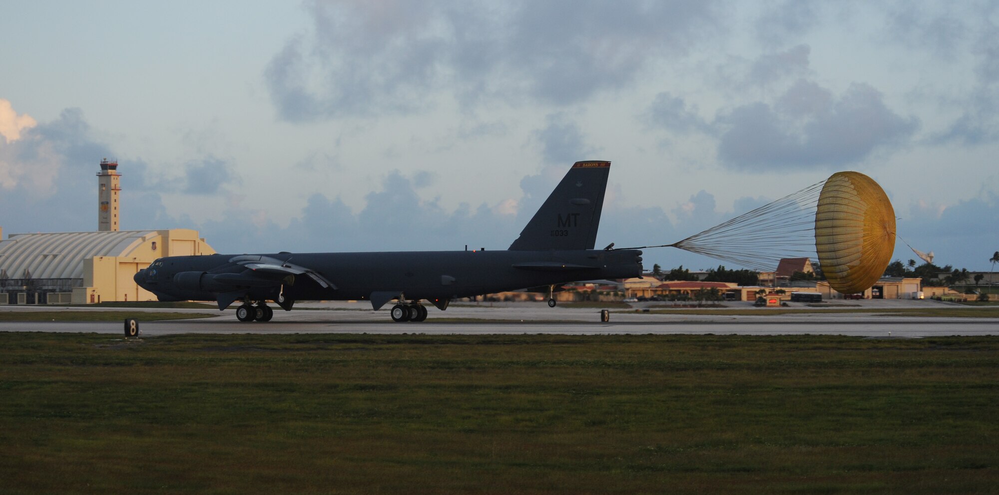 A B-52 Stratofortress from the 23rd Expeditionary Bomb Squadron from Minot Air Force Base, N.D., deploys a drogue chute upon landing at Andersen Air Force Base, Guam after a mission during an Aces North exercise. Aces North is a two week mission employment phase of the Australians version of the U.S. Air Force Weapons School.  The exercise is scheduled to end Dec. 4. The bomber's participation in constant training helps emphasize the U.S. bomber presence, demonstrating U.S. commitment to the Pacific region.

(U.S. Air Force photo/ Master Sgt. Kevin J. Gruenwald) released





















  












 

























