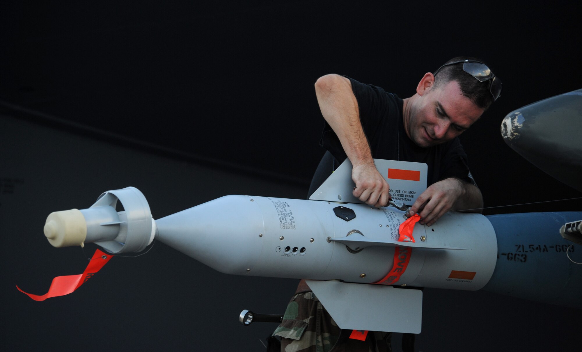 Tech. Sgt Jamie Mikus, 23rd Expeditionary Bomb Squadron weapons loader deployed from Minot Air Force Base, N.D., prepares an inert GBU-31 to be loaded onto a B-52 Stratofortress Nov. 26, at Andersen Air force Base, Guam.  Aces North is a two week mission employment phase of the Australians version of the U.S. Air Force Weapons School.   The exercise is scheduled to end Dec. 4. The bomber's participation in constant training helps emphasize the U.S. bomber presence, demonstrating U.S. commitment to the Pacific region.

(U.S. Air Force photo/ Master Sgt. Kevin J. Gruenwald) released





















  












 

























