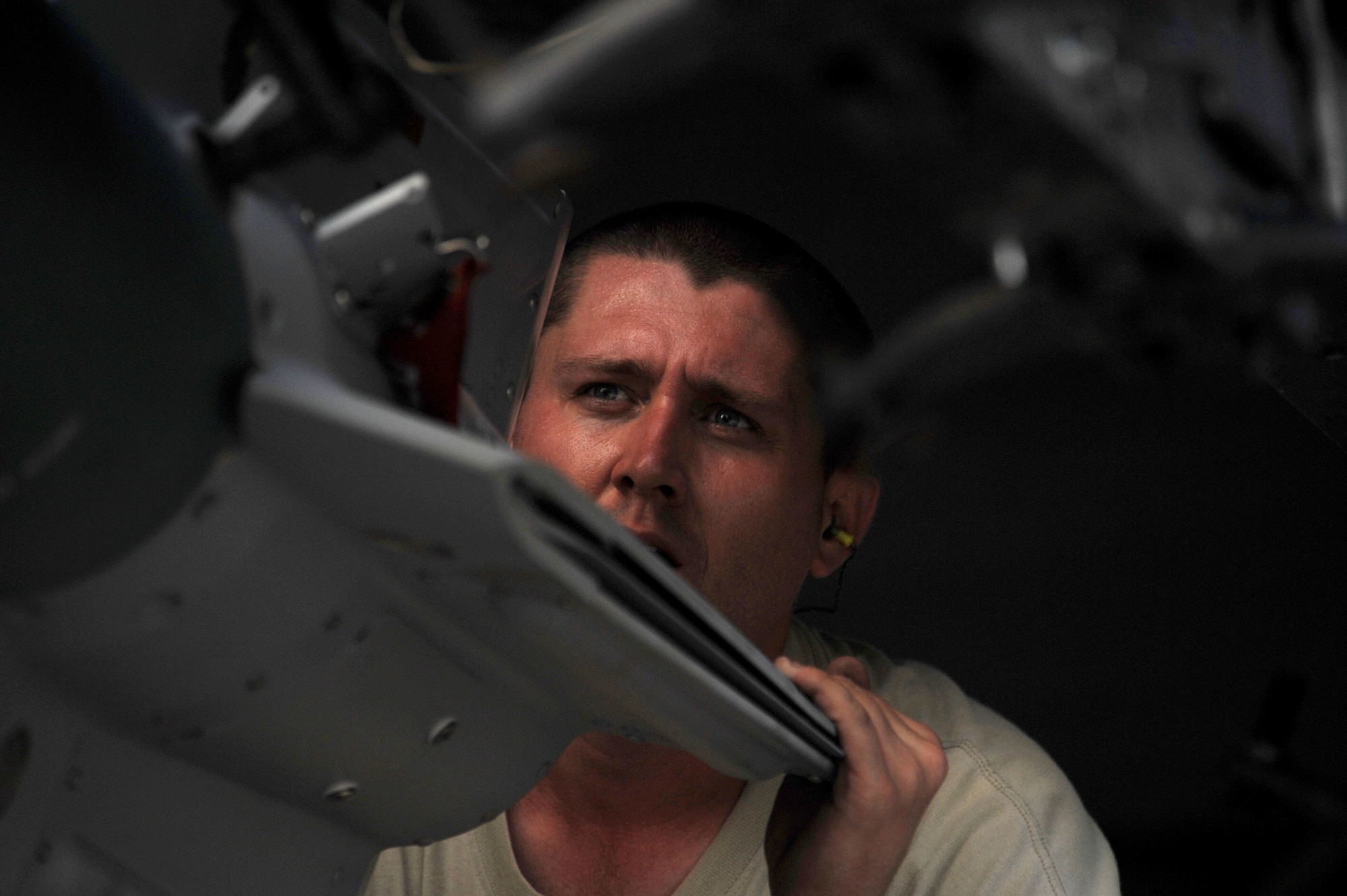 Staff Sgt. Richard Timmerman, 23rd Expeditionary Bomb Squadron weapons loader deployed from Minot Air Force Base, N.D., guides an inert GBU-31 to be loaded onto a B-52 Stratofortress Nov. 26, at Andersen Air force Base, Guam during the Aces North exercise. Aces North is a two week mission employment phase of the Australians version of the U.S. Air Force Weapons School.  The exercise is scheduled to end Dec. 4. The bomber's participation in constant training helps emphasize the U.S. bomber presence, demonstrating U.S. commitment to the Pacific region.


(U.S. Air Force photo/ Master Sgt. Kevin J. Gruenwald) released



















  












 

























