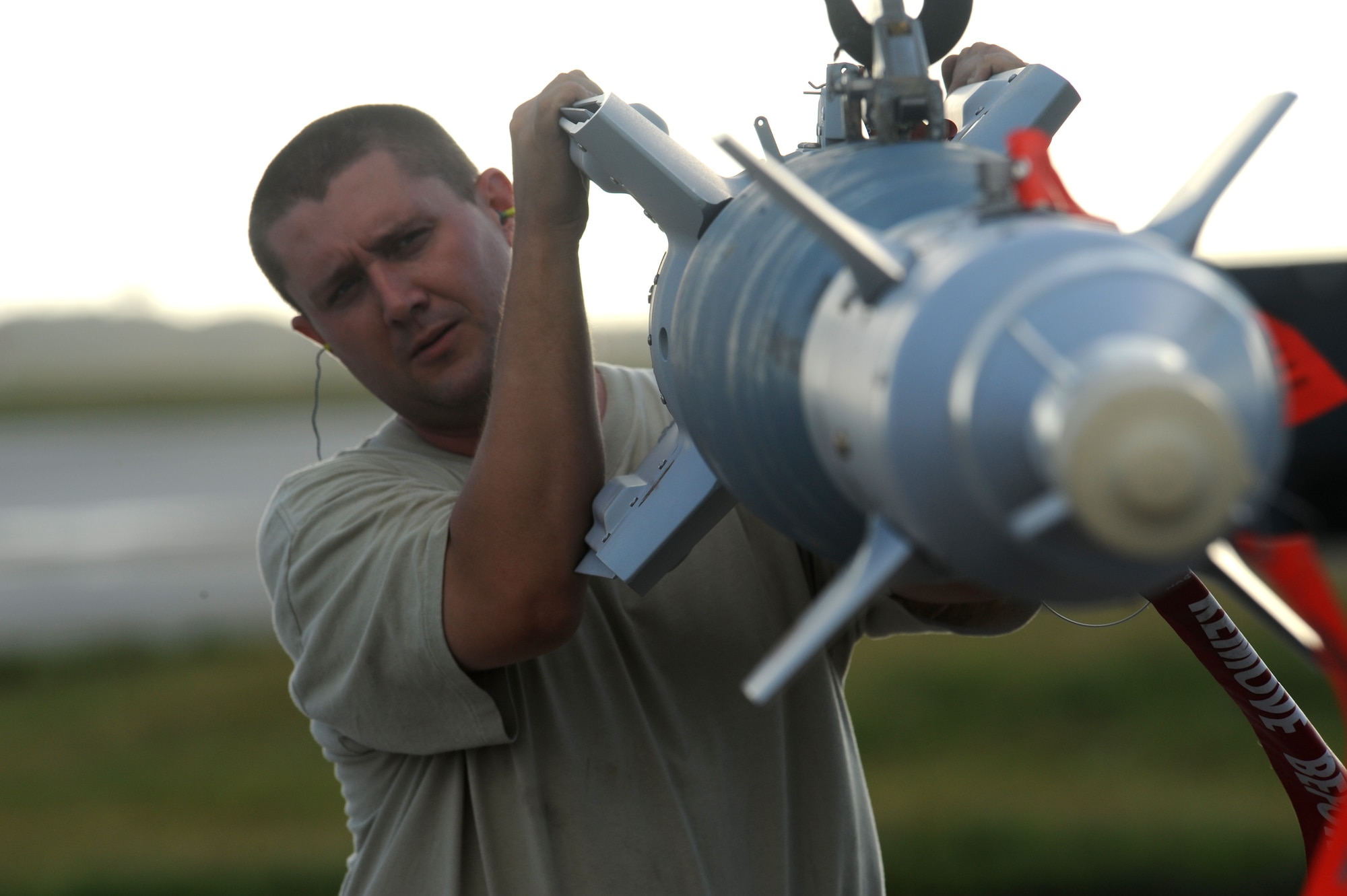 Staff Sgt. Richard Timmerman, 23rd Expeditionary Bomb Squadron weapons loader deployed from Minot Air Force Base, N.D., guides an inert GBU-31 to be loaded onto a B-52 Stratofortress Nov. 26, at Andersen Air force Base, Guam during the Aces North exercise. Aces North is a two week mission employment phase of the Australians version of the U.S. Air Force Weapons School.  The exercise is scheduled to end Dec. 4. The bomber's participation in constant training helps emphasize the U.S. bomber presence, demonstrating U.S. commitment to the Pacific region.


(U.S. Air Force photo/ Master Sgt. Kevin J. Gruenwald) released



















  












 

























