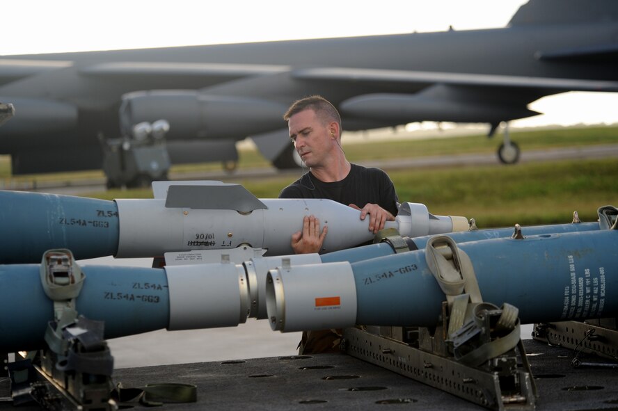 Tech. Sgt Jamie Mikus, 23rd Expeditionary Bomb Squadron weapons loader deployed from Minot Air Force Base, N.D., prepares an inert GBU-31 to be loaded onto a B-52 Stratofortress Nov. 26, at Andersen Air Force Base, Guam during the Aces North exercise. Aces North is a two week mission employment phase of the Australians version of the U.S. Air Force Weapons School.   The exercise is scheduled to end Dec. 4. The bomber's participation in constant training helps emphasize the U.S. bomber presence, demonstrating U.S. commitment to the Pacific region.


(U.S. Air Force photo/ Master Sgt. Kevin J. Gruenwald) released



















  












 

























.
(U.S. Air Force photo/ Master Sgt. Kevin J. Gruenwald) released


















  












 

























