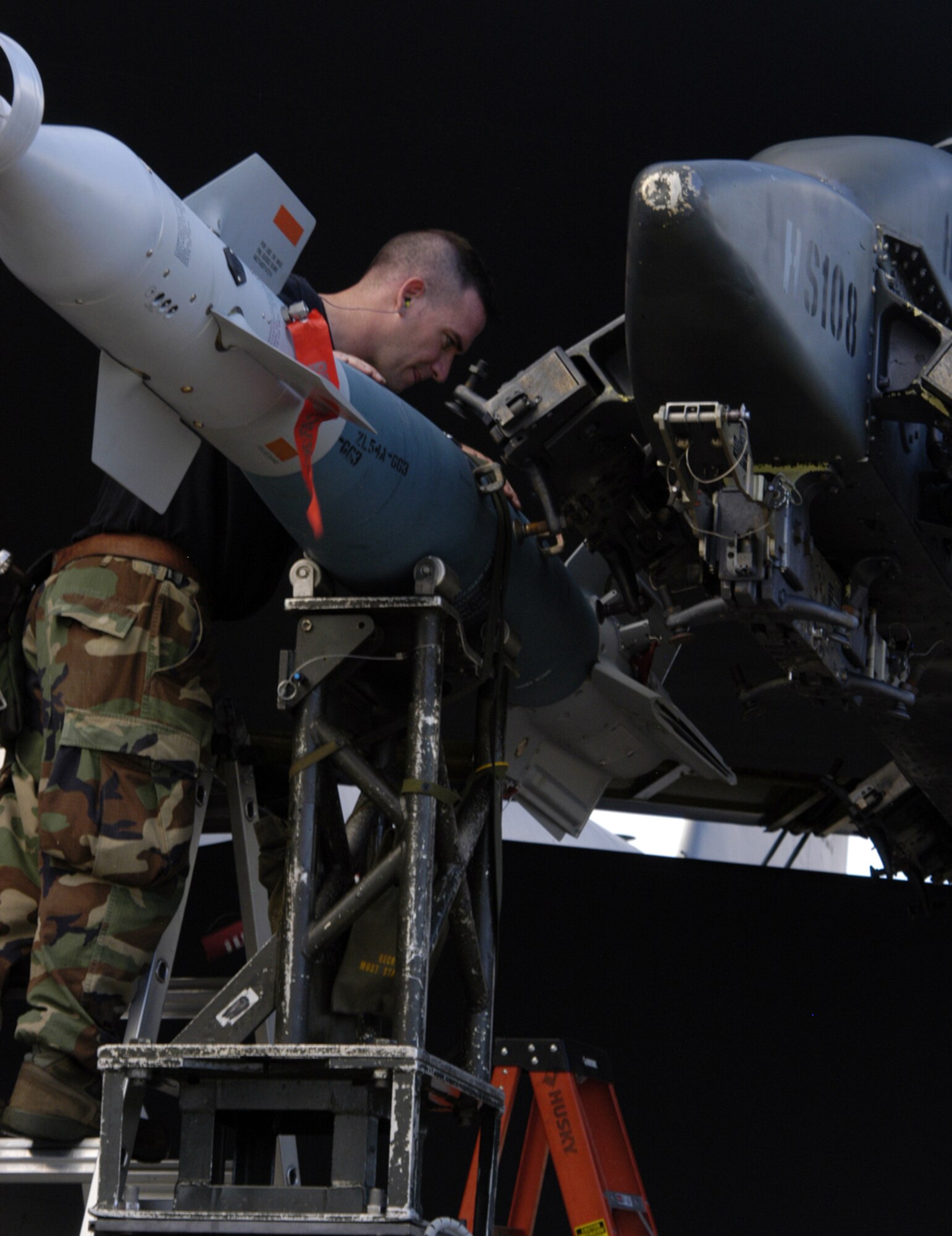 Tech. Sgt Jamie Mikus, 23rd Expeditionary Bomb Squadron weapons loader deployed from Minot Air Force Base, N.D., prepares an Inert GBU-31 to be loaded onto a B-52 Stratofortress Nov. 26, at Andersen Air Force Base, Guam during the Aces North exercise.  Aces North is a two week mission employment phase of the Australians version of the U.S. Air Force Weapons School.   The exercise is scheduled to end Dec. 4. The bomber's participation in constant training helps emphasize the U.S. bomber presence, demonstrating U.S. commitment to the Pacific region.


(U.S. Air Force photo/ AIC Ryan Whitney)  released


















  












 

























