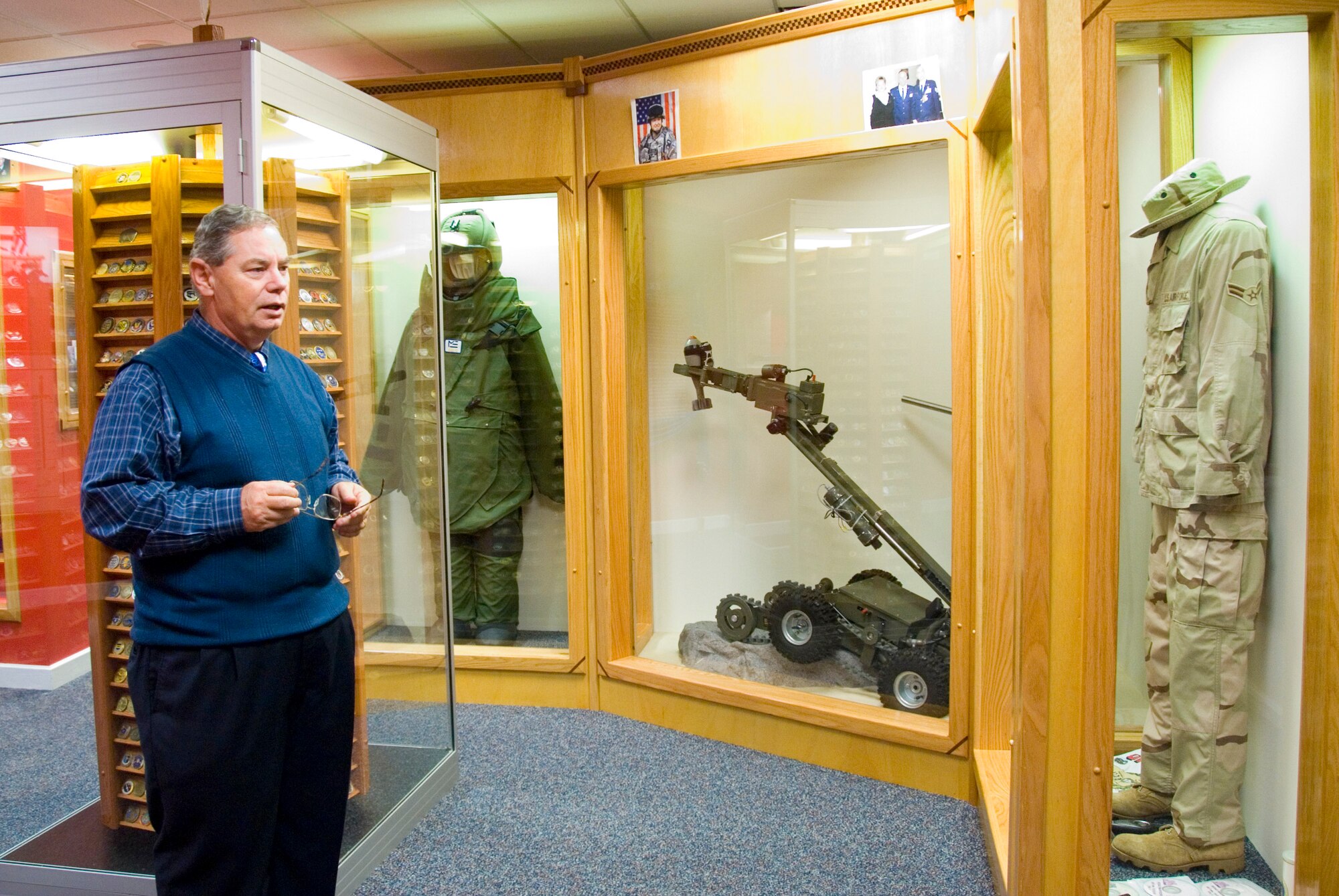 The explosive ordnance demolition display in the new “Berlin to Baghdad” wing of Enlisted Heritage Hall features a bomb disposal suit, explosives disposal robot and career field uniform. The exhibit will eventually incorporate graphic backgrounds to better illustrate the duties of EOD personnel. (Air Force photo by Jamie Pitcher)