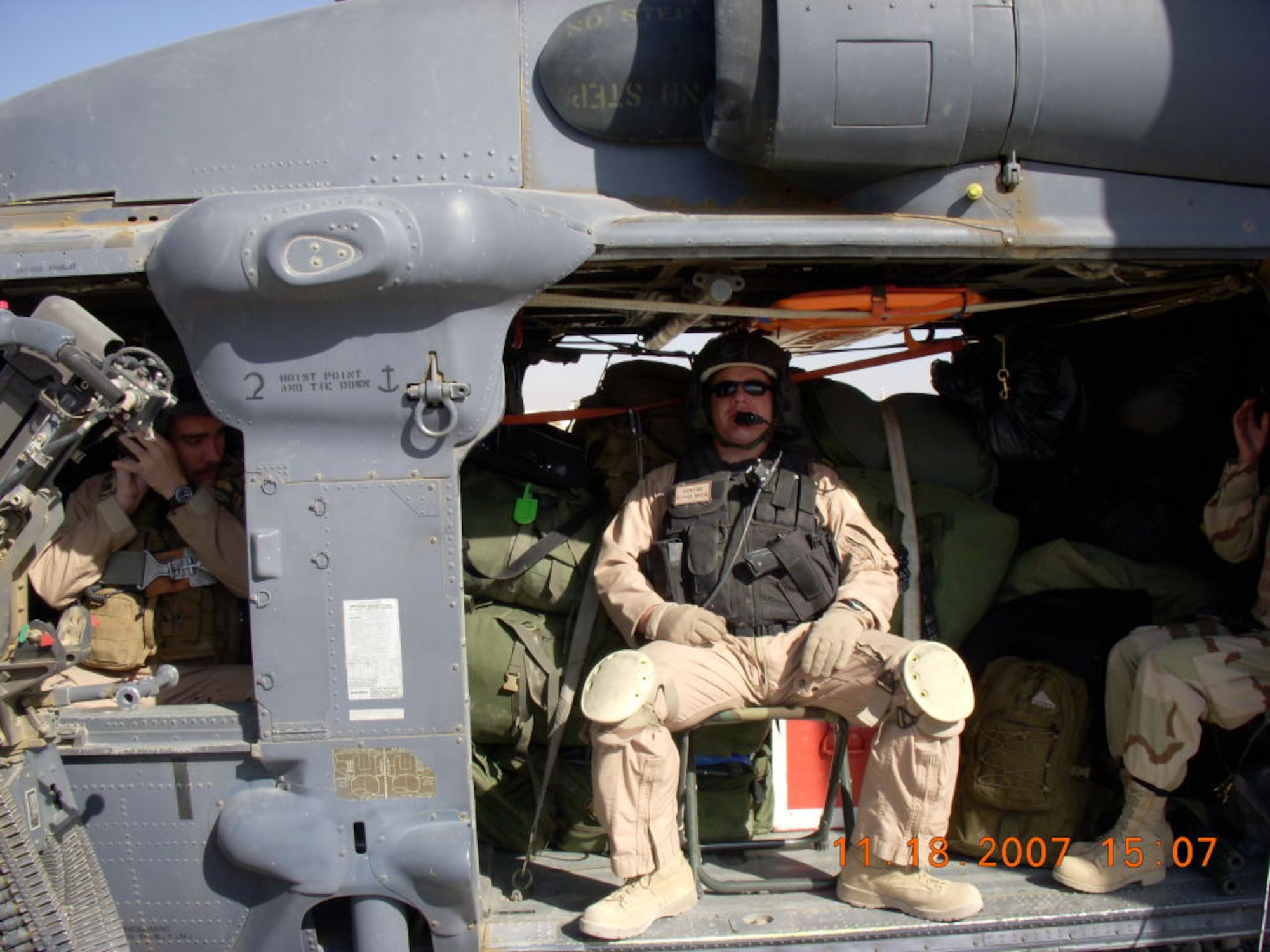Tech. Sgt. David Denton, 375th Aeromedical Evacuation squadron senior flight medic, prepares for take-off while serving in Afghanistan last year.

(Courtesy photo)