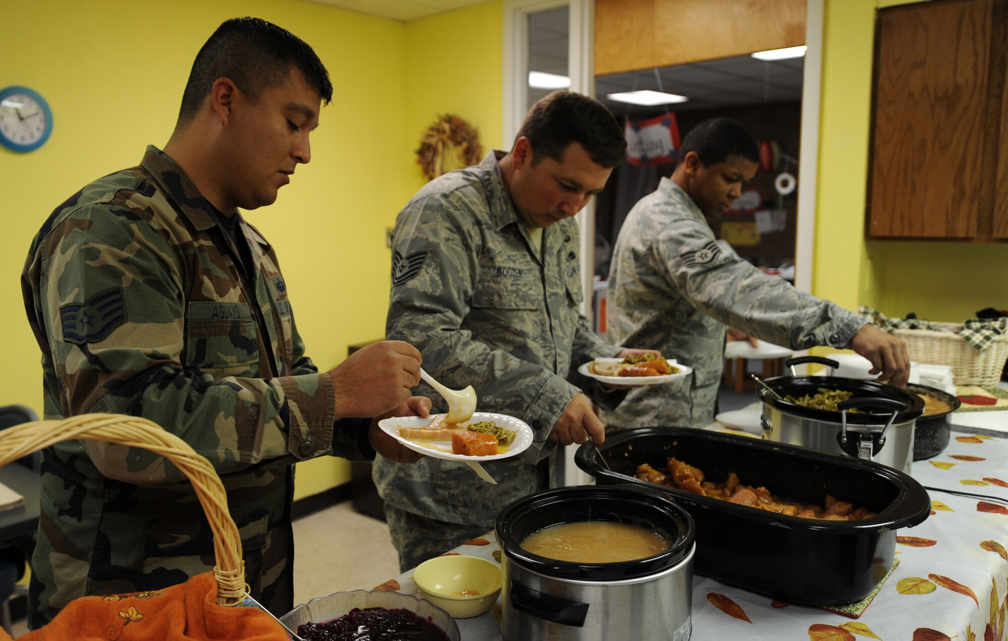 Members of Team Holloman attend the annual Family Feast at a Child Develpoment Centers at Holloman Air Force Base, N.M., Nov. 24. Parents were invited to come have lunch with their children at the CDC in support of Military family Appreciation Month. (U.S. Air Force photo/Airman 1st Class Michael Means)