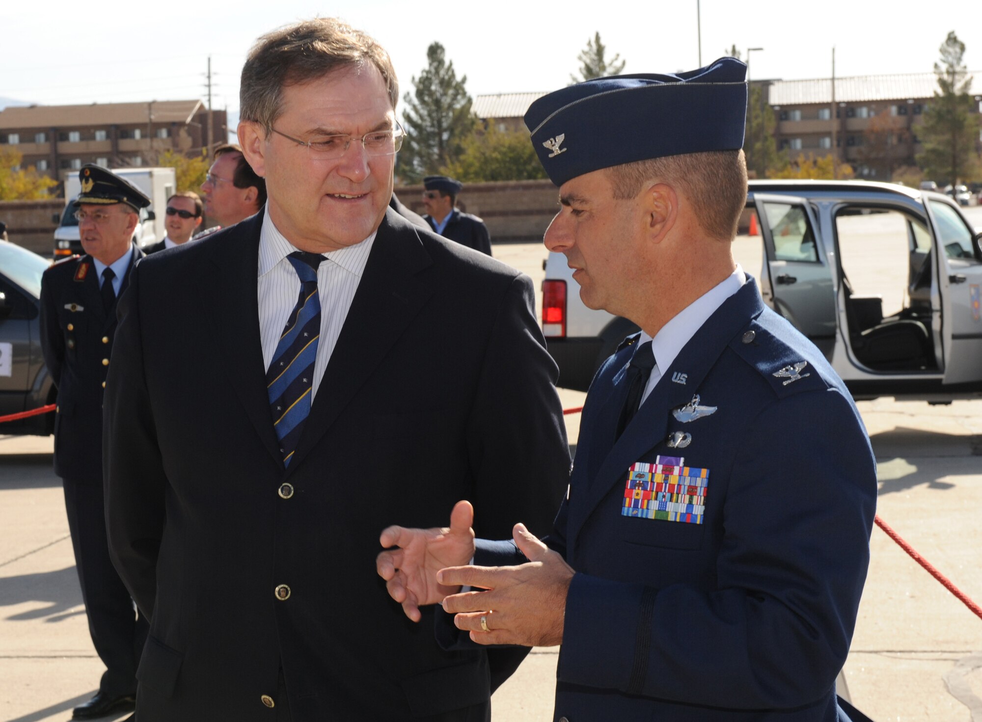 Col. Jeff Harrigian, 49th Fighter Wing commander, speaks with Minister Franz Josef Jung, German Minister of Defense, during his visit to Holloman Air Force Base, N.M., Nov. 24. Minister Jung came to visit Holloman to see the German Air Force Flying Training Center. The German air force has been training its aircrews throughout the United States since 1958 before it was moved to Holloman in 1992. (U.S. Air Force photo/Airman 1st Class Michael Means)