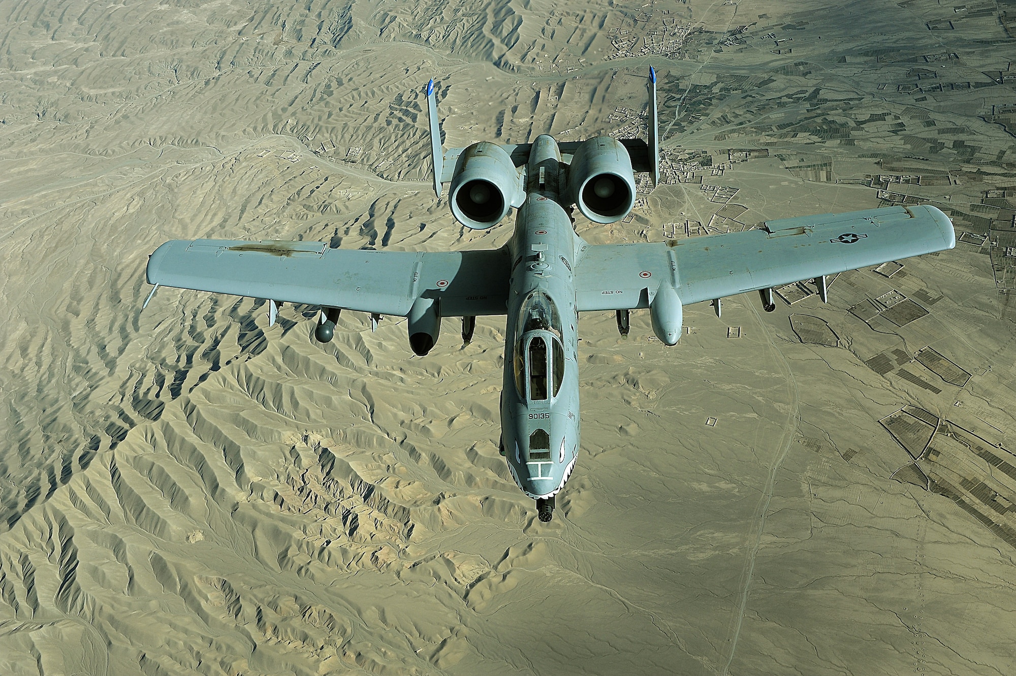 An A-10 Thunderbolt II flies a combat mission over Afghanistan providing armed aerial overwatch for coalition forces. A-10s provide close-air support and employ a wide variety of conventional munitions, including general purpose bombs. (U.S. Air Force photo/Staff Sgt. Aaron Allmon)  

