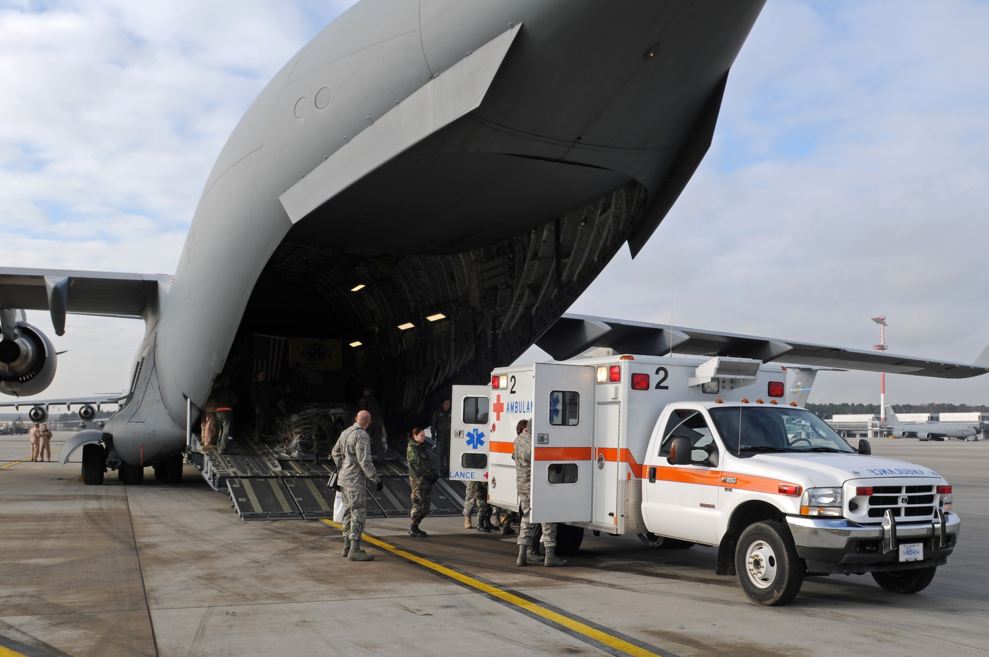 Airmen unload medical supplies from a C-17 Globemaster III, Ramstein Air Base, Germany, Nov. 27, 2008. The C-17 arrived from Andrew Air Force Base, Maryland. (U.S. Air Force photo by Airman 1st Class Grovert Fuentes-Contreras)