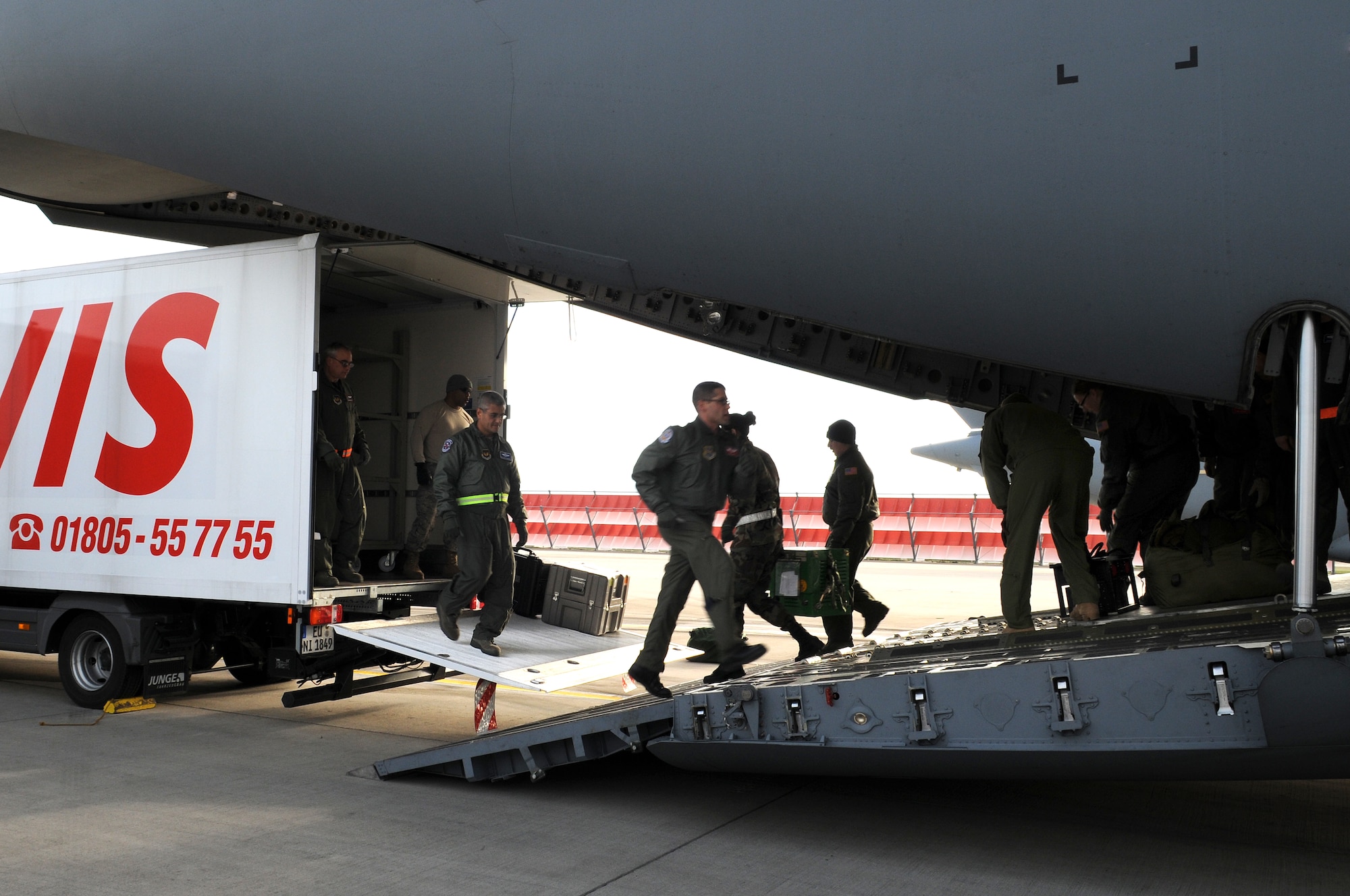 Airmen unload medical supplies from a C-17 Globemaster III, Ramstein Air Base, Germany, Nov. 27, 2008. The C-17 arrived from Andrew Air Force Base, Maryland. (U.S. Air Force photo by Airman 1st Class Grovert Fuentes-Contreras)