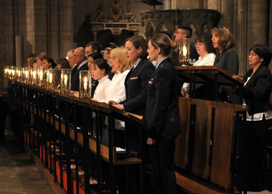 Capt. Meghann Fletcher and Kathleen Pohl, both members of the choir, sing a hymn during the annual Thanksgiving service held at the Ely Cathedral Nov. 26, 2008, in Ely, England. (U.S. Air Force photo by Staff Sgt. Jerry Fleshman)