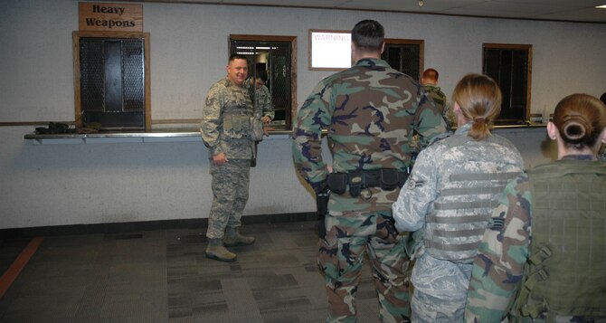 Airmen from the 741st Missile Security Forces Squadron arm-up prior to posting to the missile field Nov. 24. (U.S. Air Force photo/Senior Airman Dillon White)