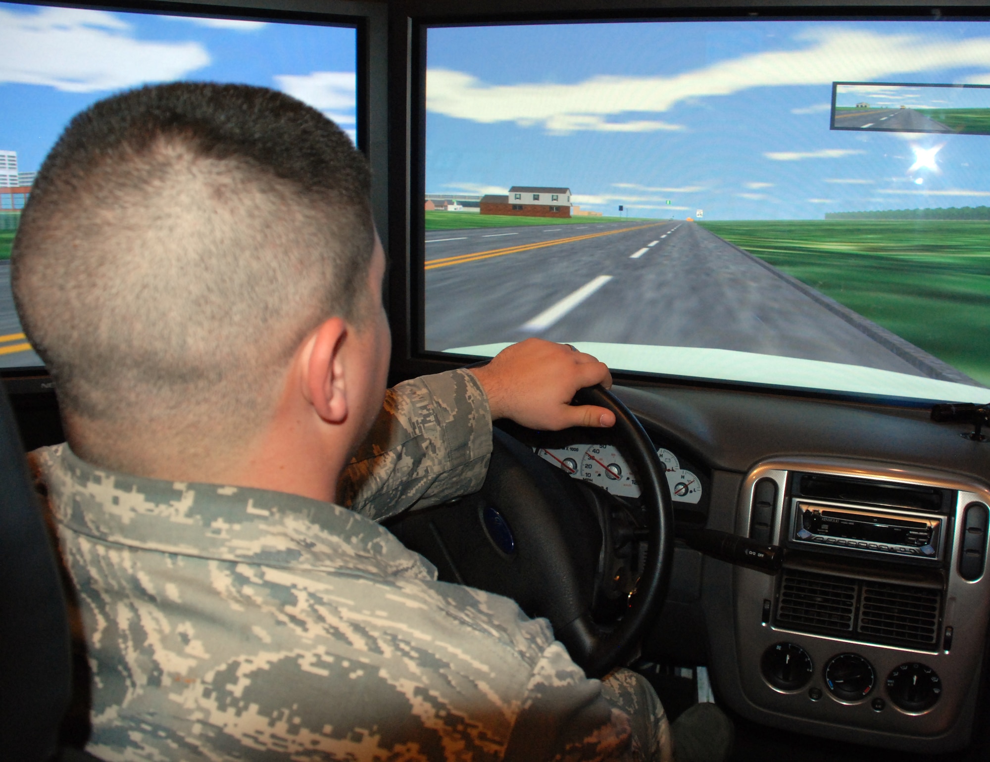 Senior Airman Steven Ocker, a utility journeyman with the 82nd Civil Engineering Squardon, learns through the drinking and driving simulator how alcohol effects the ability to drive. The Save-a-Life Tour grabbed Sheppard's attention with emotional and graphic videos, personal stories, national statistics, and a drinking and driving simulator. (U.S. Air Force photo/Airman 1st Class Candy Miller)
