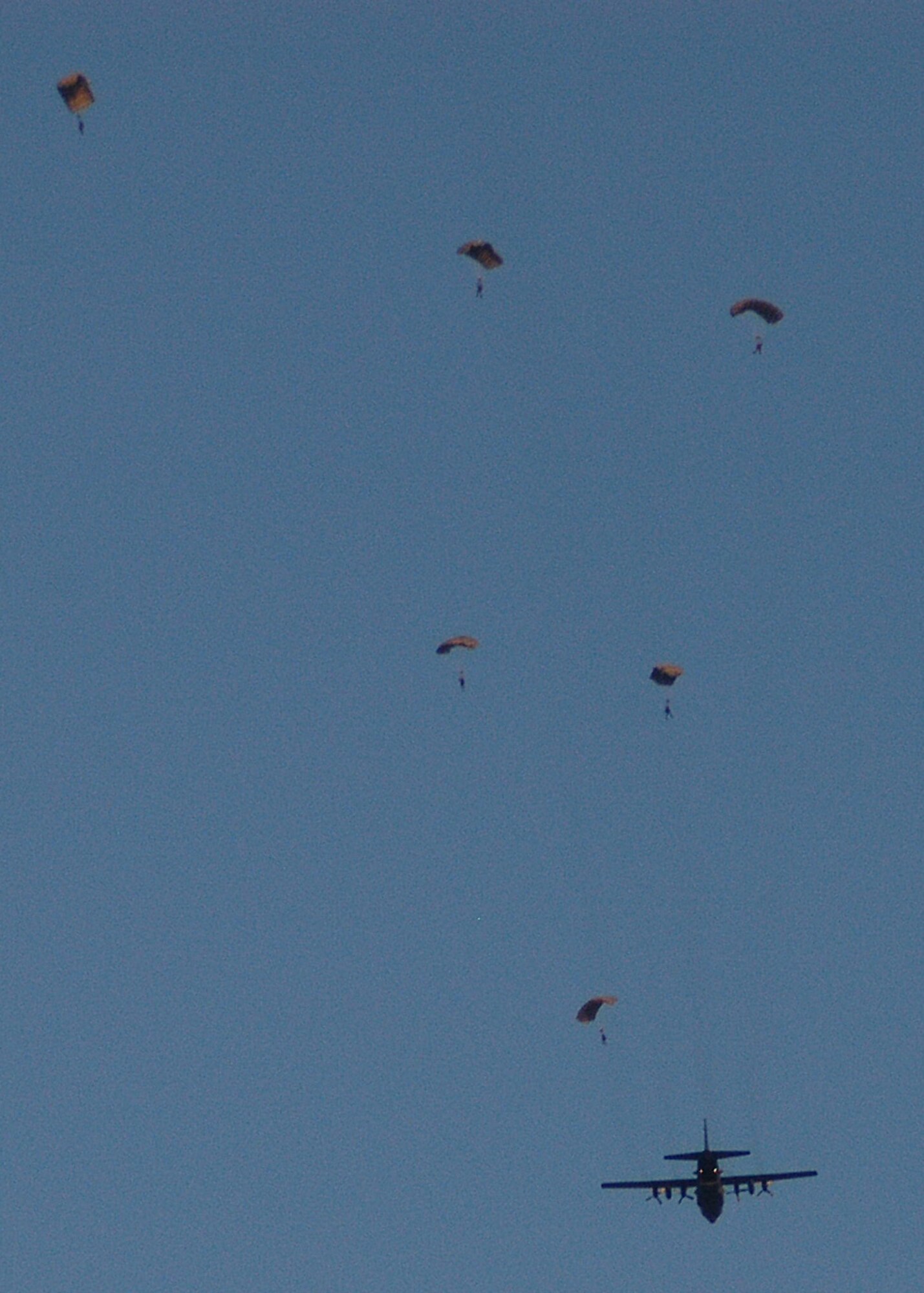 KADENA AIR BASE, Japan -- Pararescuemen and combat controllers from the 320th Special Tactics Squadron jump from a 1st Special Operations Squadron MC-130H Combat Talon II here Dec. 2 to search for survivors of a simulated aircraft accident. The event was part of a 353rd Special Operations Group training exercise testing the group?s ability to conduct search and rescue operations from start to finish. (U.S. Air Force photo by Tech. Sgt. Aaron Cram)