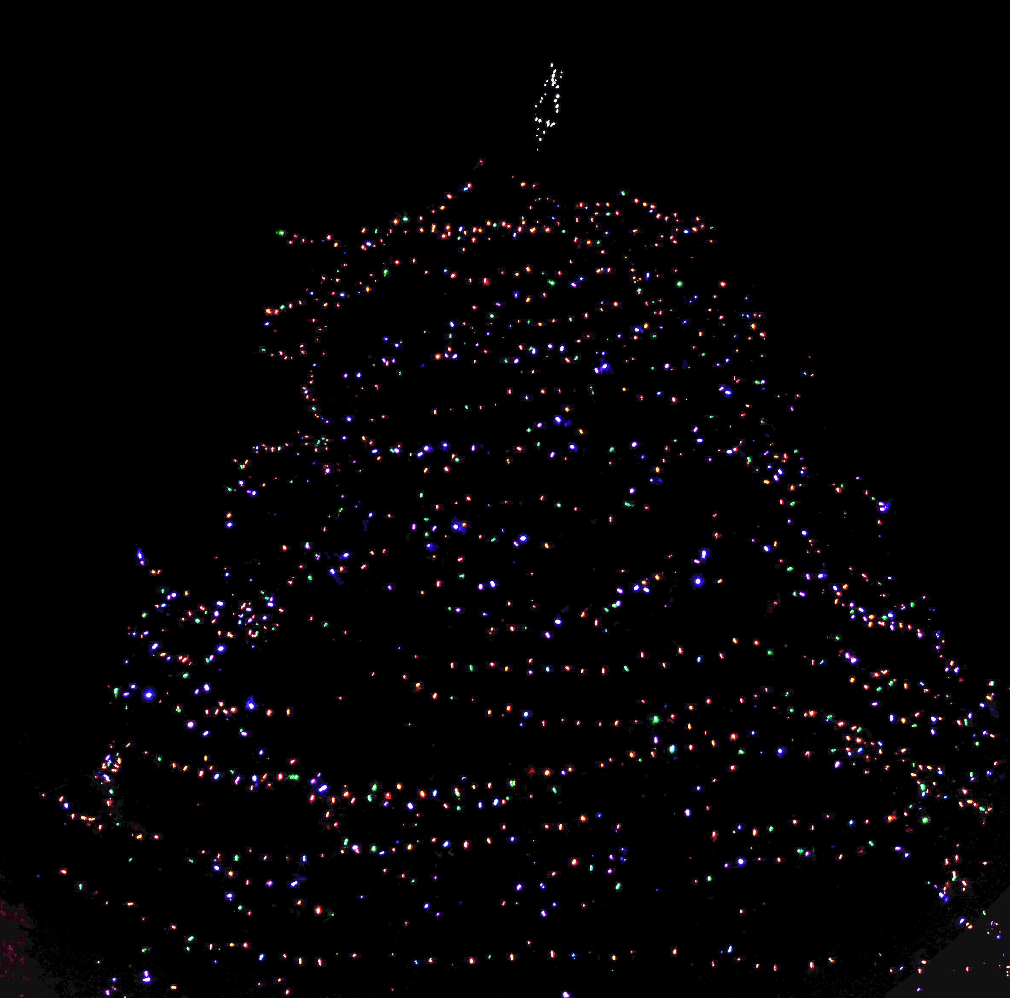 The base tree stands brightly lit after the Christmas tree lighting ceremony Dec 2, 2008 on Seymour Johnson Air Force Base, N.C. The ceremony brought families of the 4th Fighter Wing together to come and watch the tree lighting as well as enjoy a nice cup of hot cocoa. (U.S. Air Force photo by Airman 1st Class Gino Reyes)
