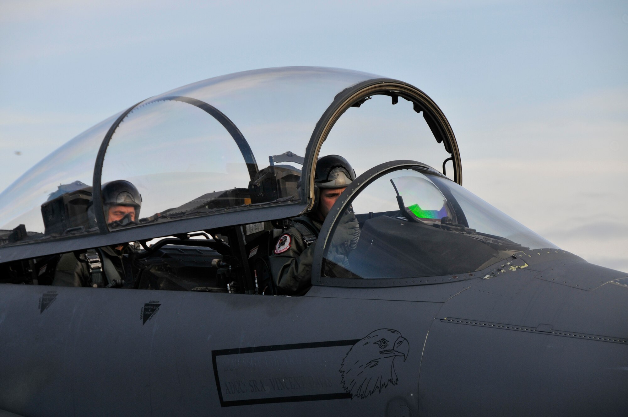 Capt. William Wooten, 494th Fighter Squadron, closes the canopy Dec. 1 at RAF Lakenheath, England. RAF Lakenheath gave Maj. Gen. Silwer a incentive flight in the F-15E Strike Eagle. (U.S. Air Force photo by Airman 1st Class Perry Aston)