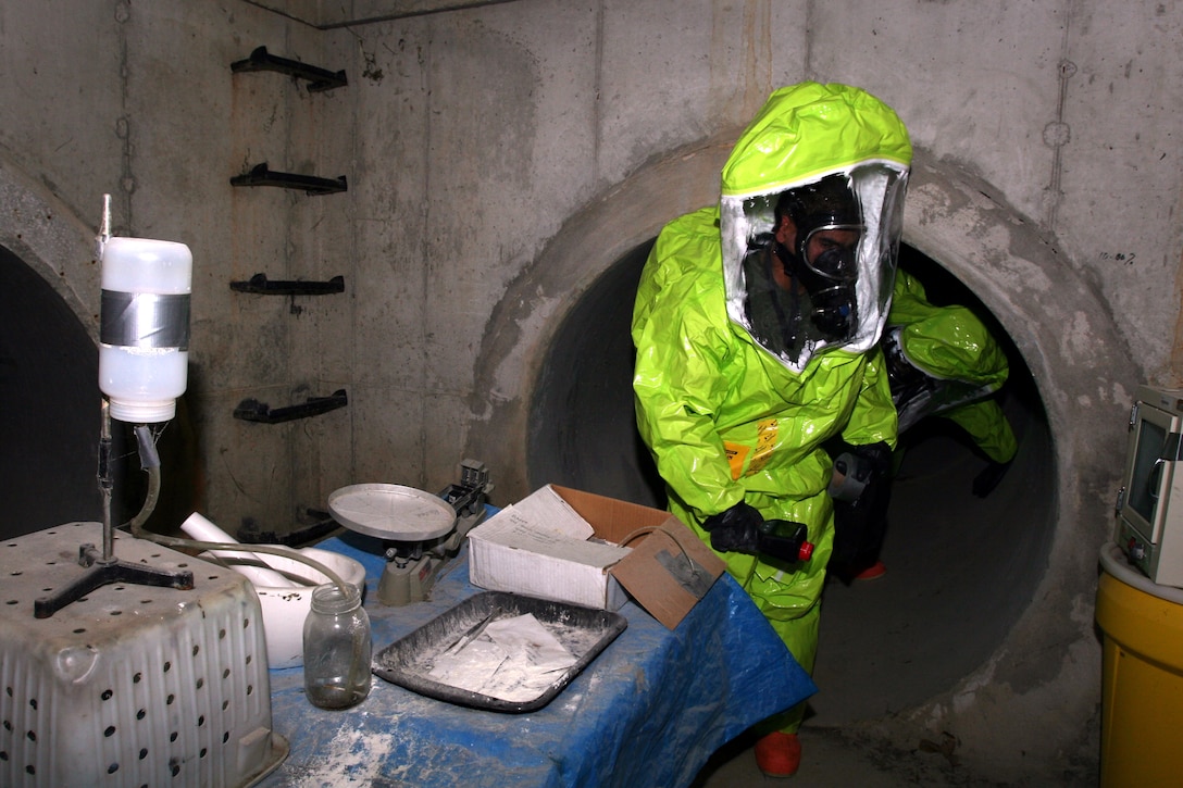 Lance Cpl. Jose Figuroa, a radio repair technician with Battalion Landing Team, 3rd Battalion, 2nd Marine Regiment, 22nd Marine Expeditionary Unit, enters a simulated chemical and biological weapons production facility in a cave complex at the First Lieutenant Terry Incident Responder Training Facility aboard Fort Leonard Wood, Mo., Dec. 4, 2008. Figuroa, a native of San Lorenzo, Puerto Rico, is a member of the 22nd MEU Chemical, Biological, Radiological and Nuclear Consequence Management Team, which traveled to Fort Leonard Wood to conduct specialized training Dec. 2 - 4. (Official Marine Corps photo by Staff Sgt. Matt Epright)