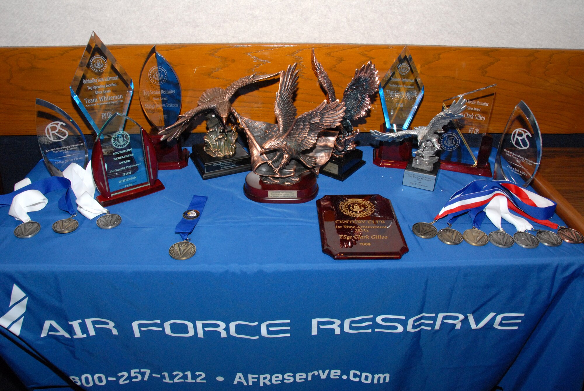Awards earned by the 442nd Fighter Wing's recruiting staff sit on a table to recognize the team's accolades in Fiscal Year 2008.  For the second consecutive year the wing's recruiters won the Top Outstanding Team Achievement Award from among all recruiters in the Air Force Reserve Command Recruiting Service.  The 442nd FW is an Air Force Reserve unit based at Whiteman Air Force Base, Mo.  (U.S. Air Force photo/Maj. David Kurle)